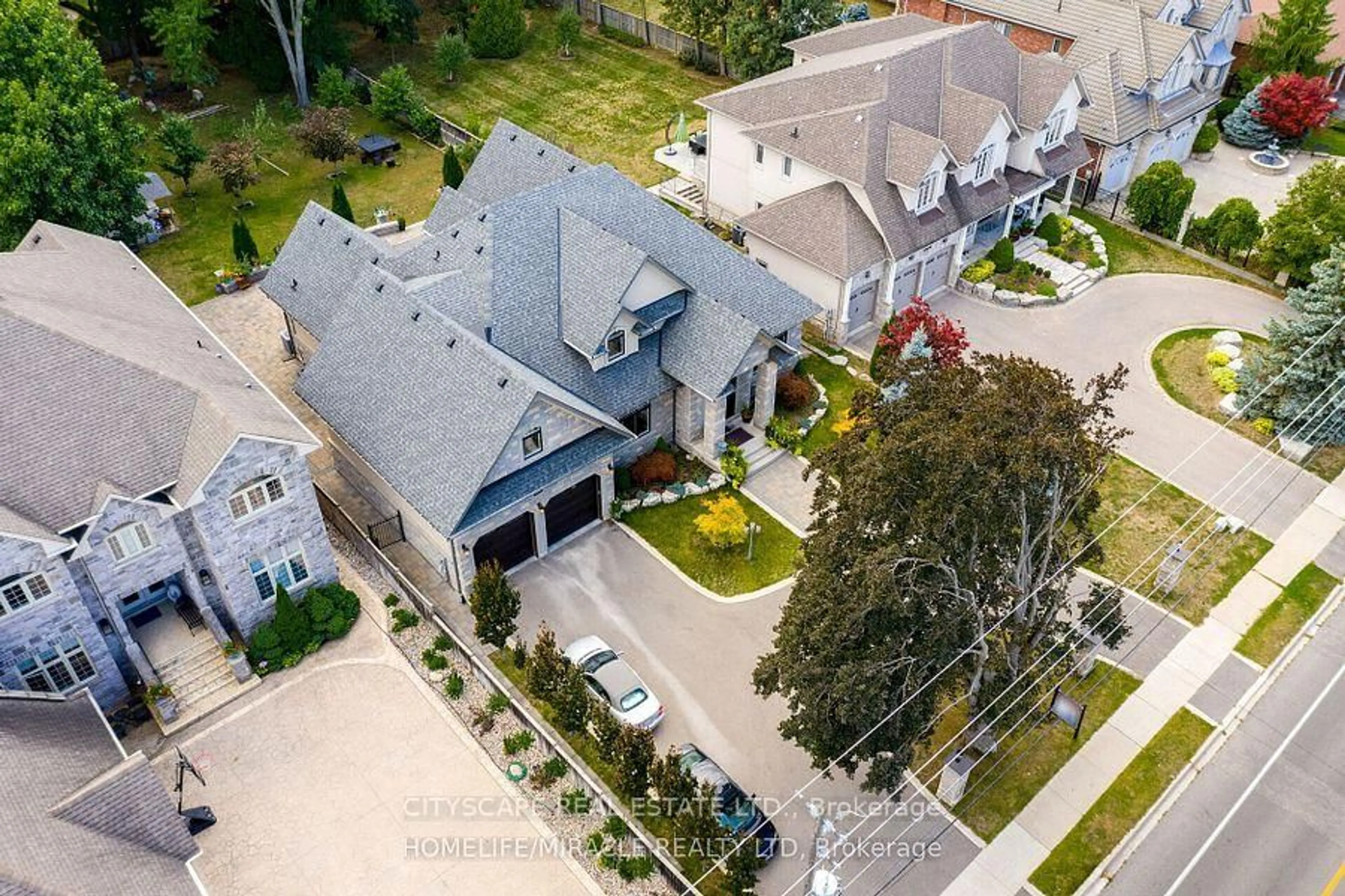 A pic from outside/outdoor area/front of a property/back of a property/a pic from drone, street for 2414 Camilla Rd, Mississauga Ontario L5A 2K5