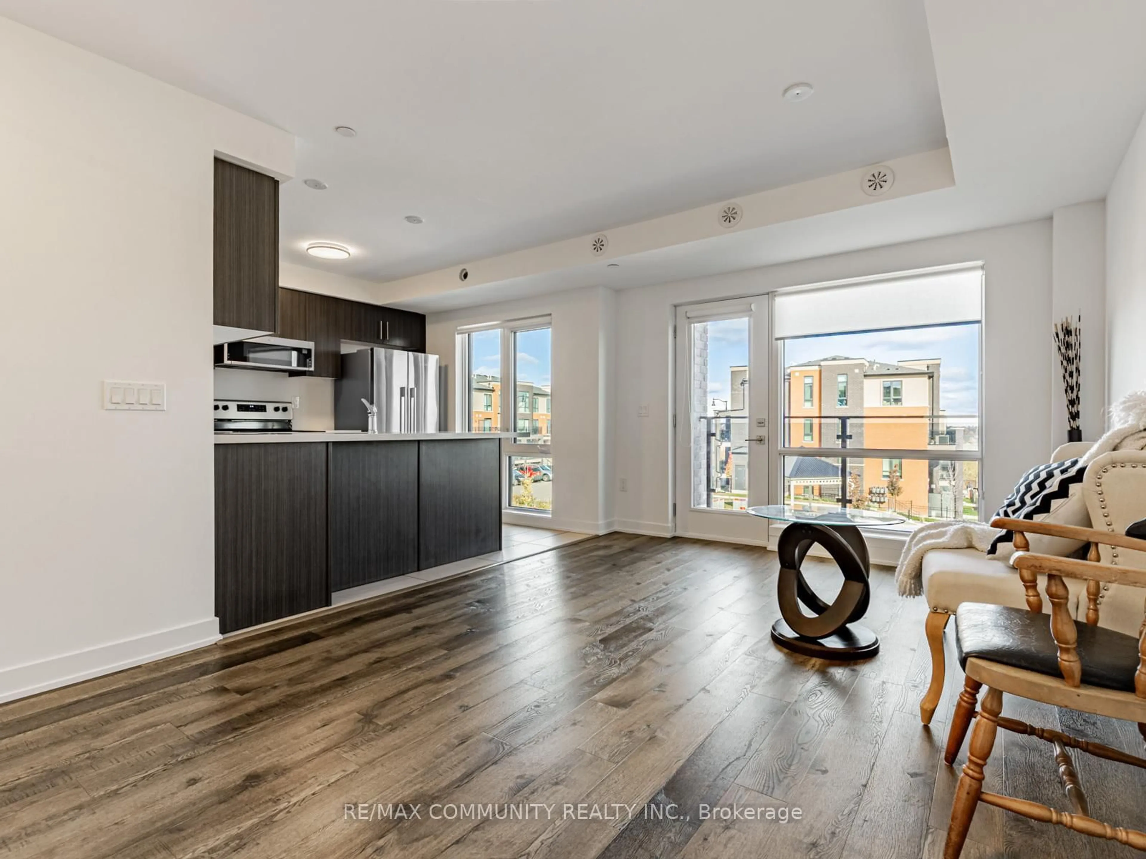 Open concept kitchen, wood/laminate floor for 175 Veterans Dr #3, Brampton Ontario L7A 5L2