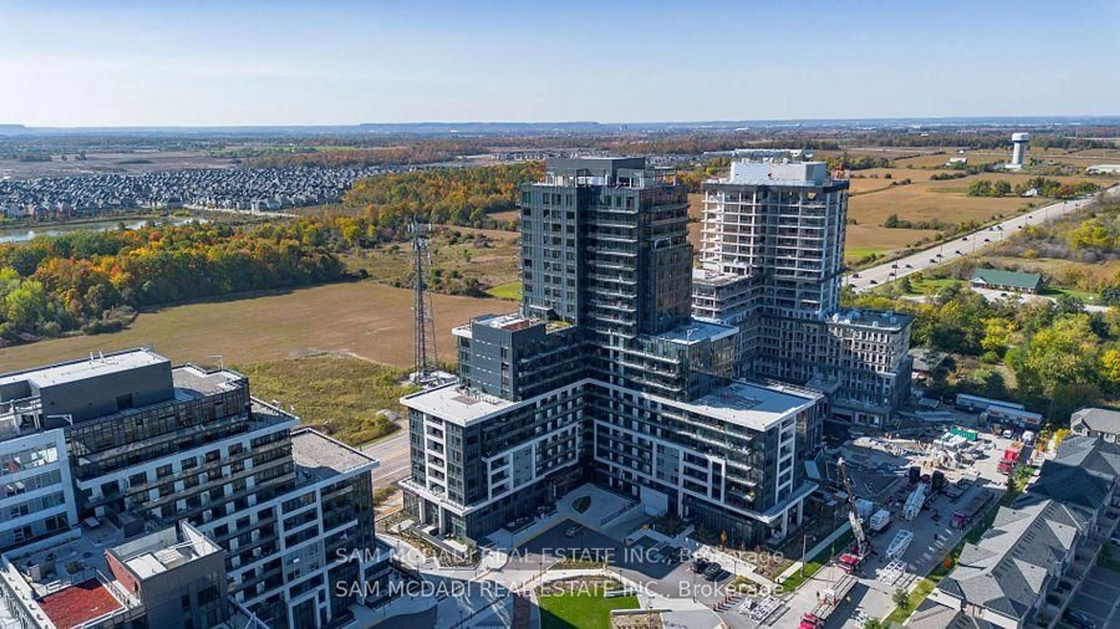 A pic from outside/outdoor area/front of a property/back of a property/a pic from drone, city buildings view from balcony for 3220 William Coltson Ave #1503, Oakville Ontario L6H 7X9
