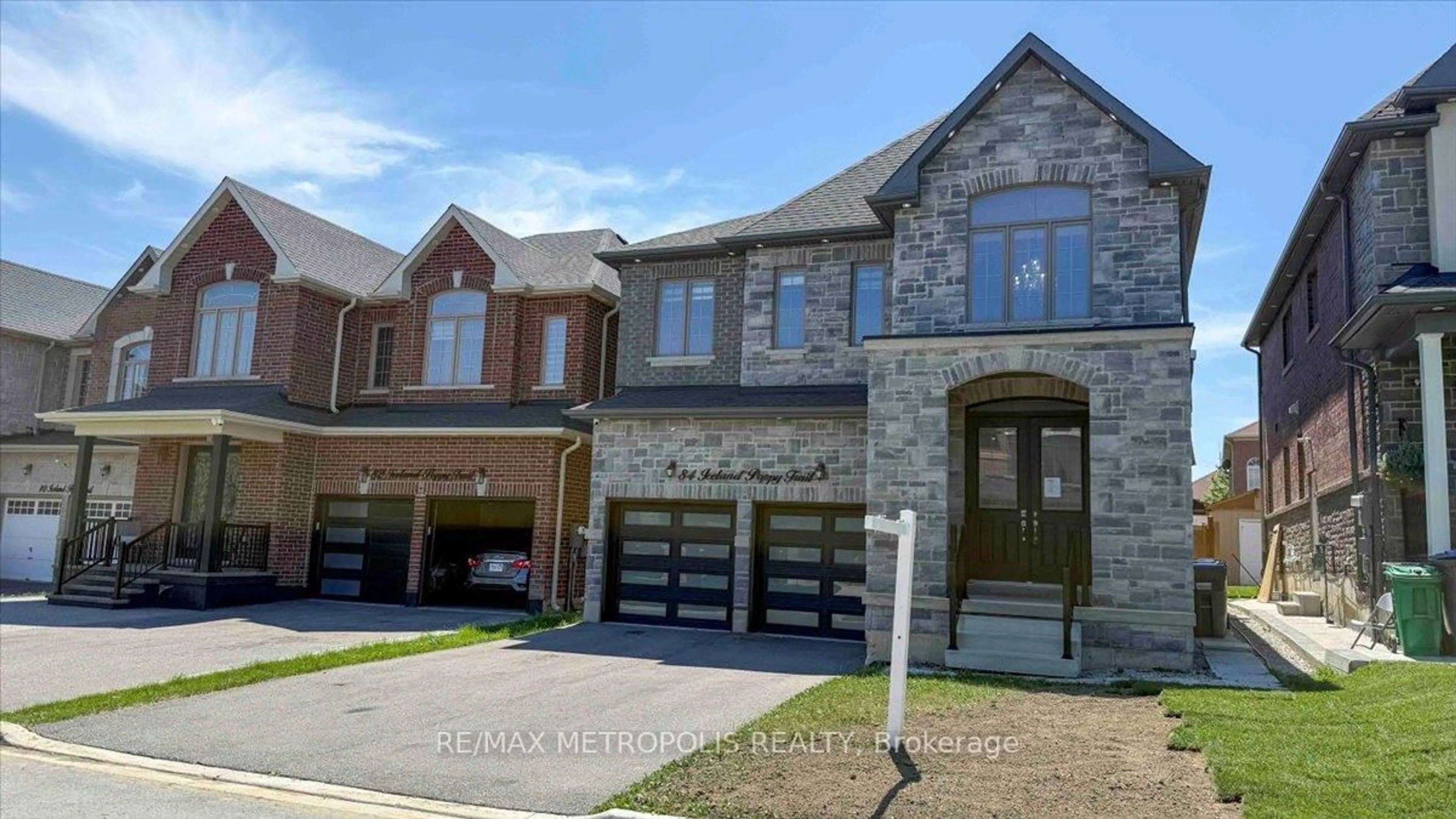 Home with brick exterior material, street for 84 Iceland Poppy Tr, Brampton Ontario L7A 0C1
