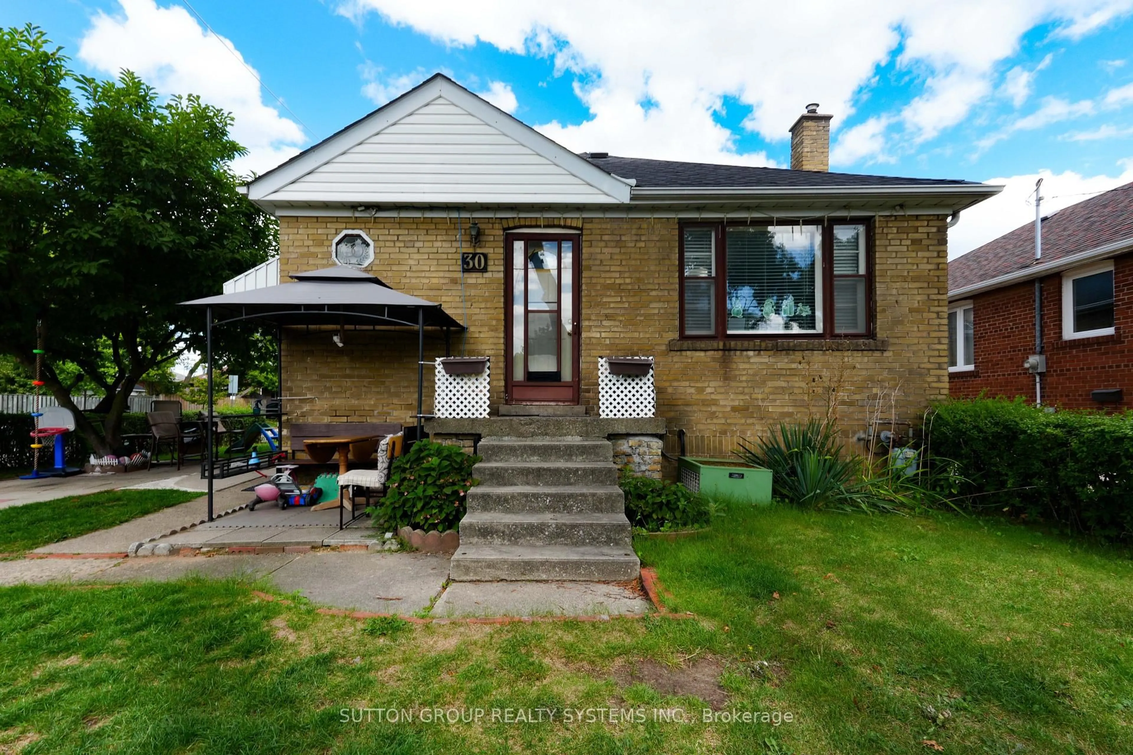 Home with brick exterior material, street for 30 Silvercrest Ave, Toronto Ontario M8W 2S4