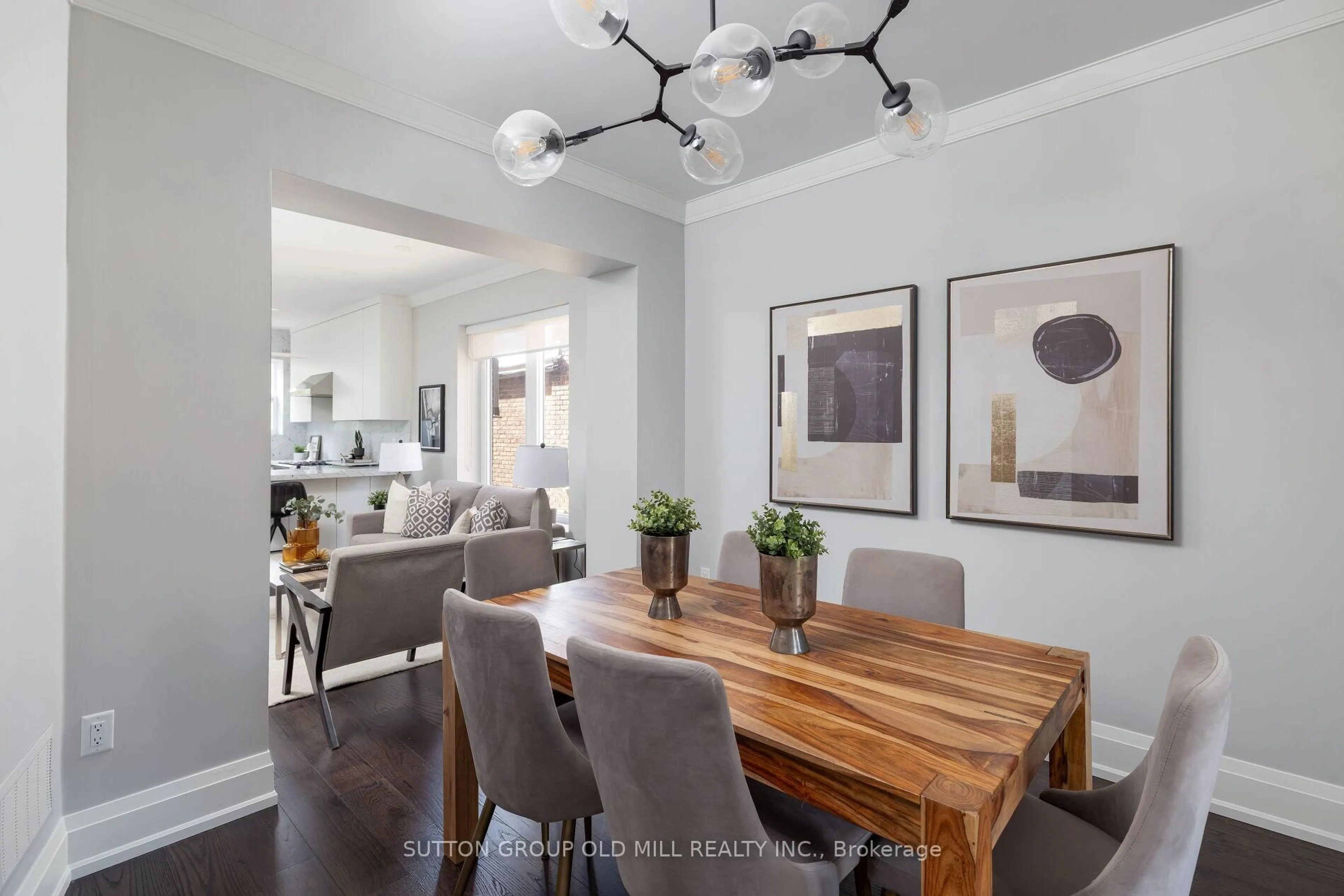 Dining room, wood/laminate floor for 69 Peterborough Ave, Toronto Ontario M6H 2L2