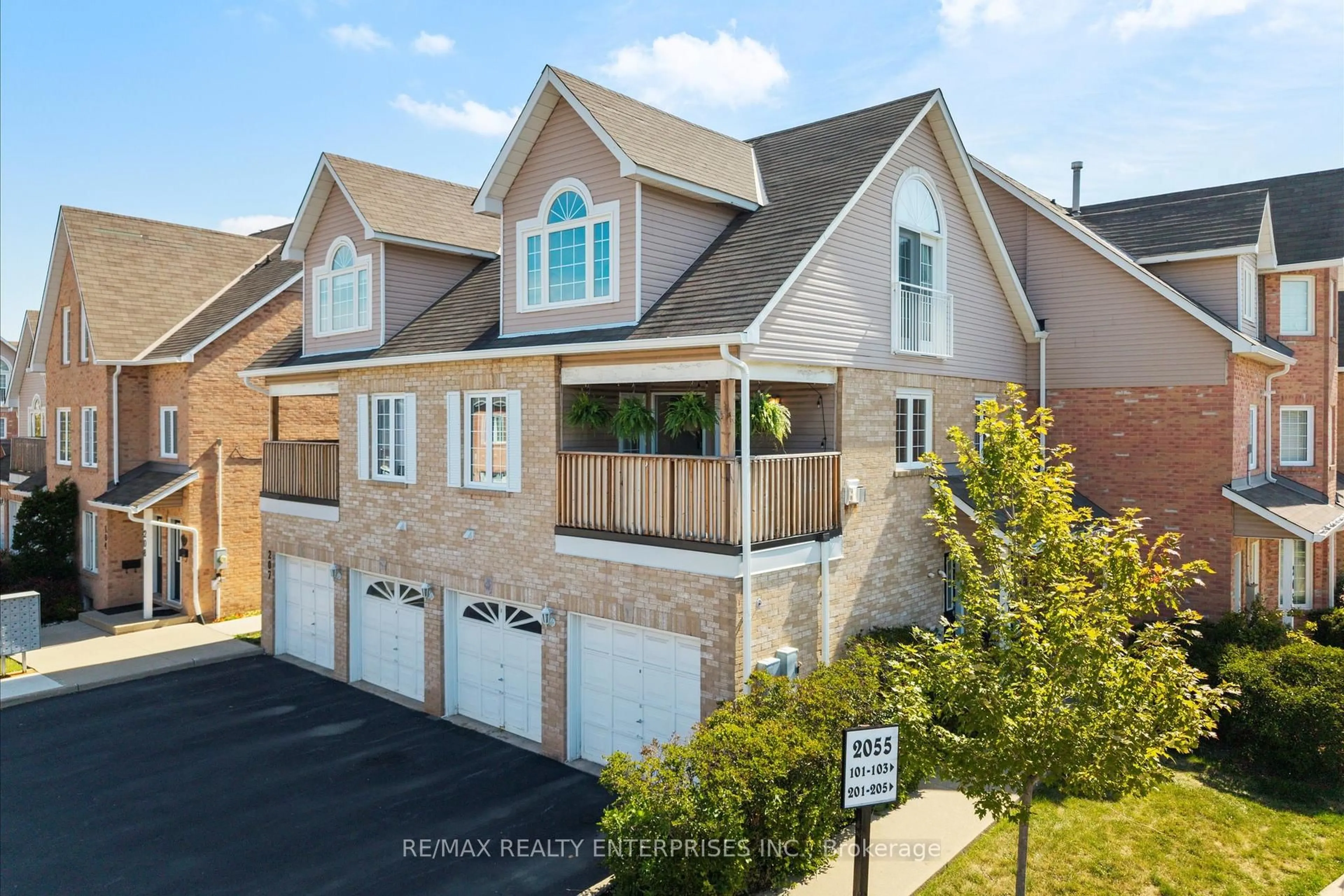 Home with brick exterior material, street for 2055 Walkers Line #206, Burlington Ontario L7M 4B5