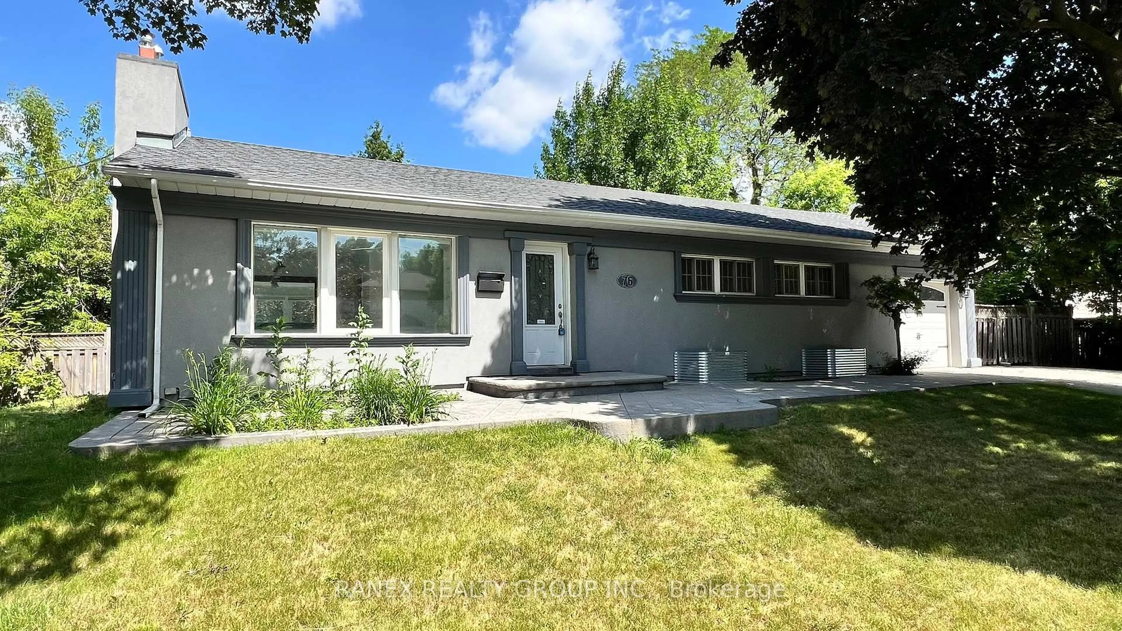 Home with vinyl exterior material, street for 76 Eldomar Ave, Brampton Ontario L6W 1R3