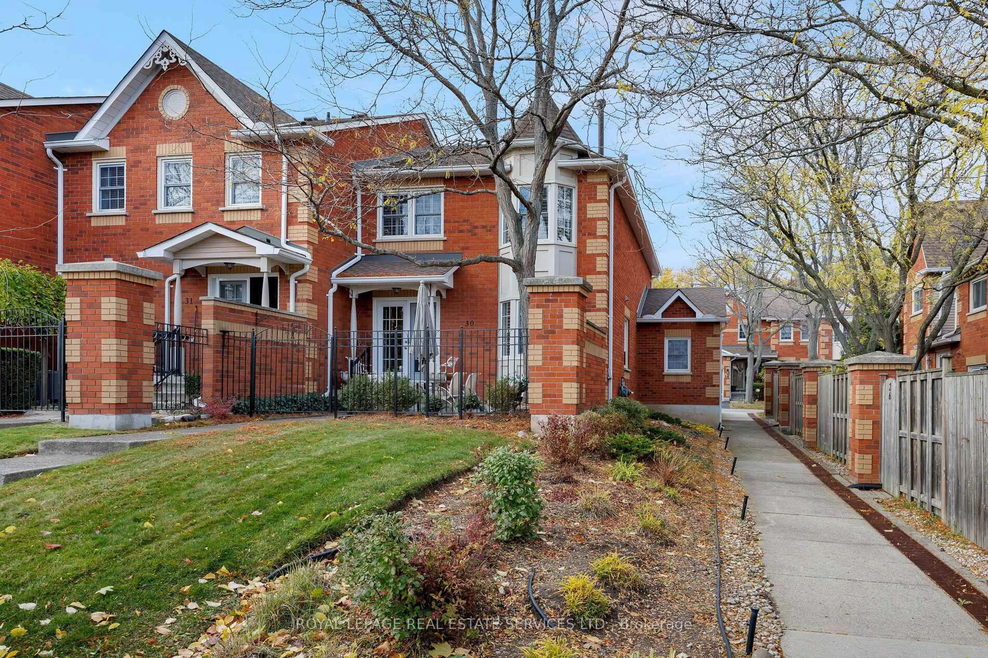 Home with brick exterior material, street for 1415 Hazelton Blvd #30, Burlington Ontario L7P 4W6
