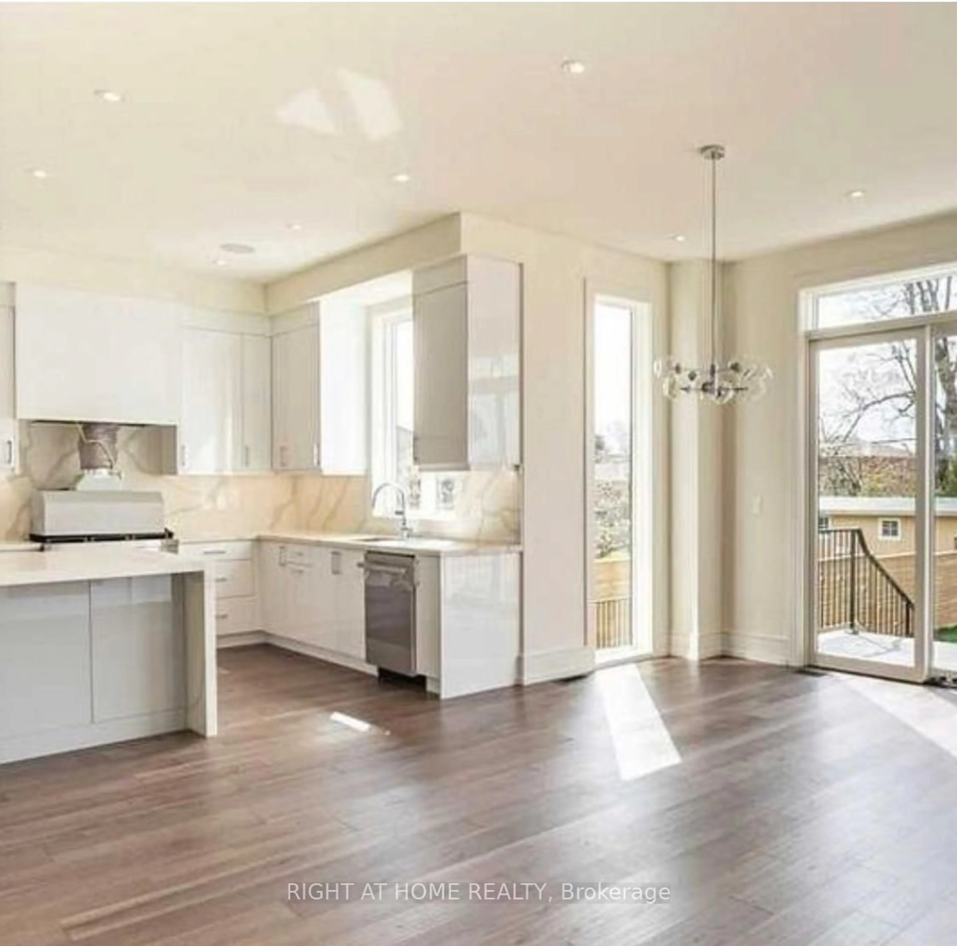 Open concept kitchen, unknown for 33 Cartwright Ave, Toronto Ontario M6A 1T8