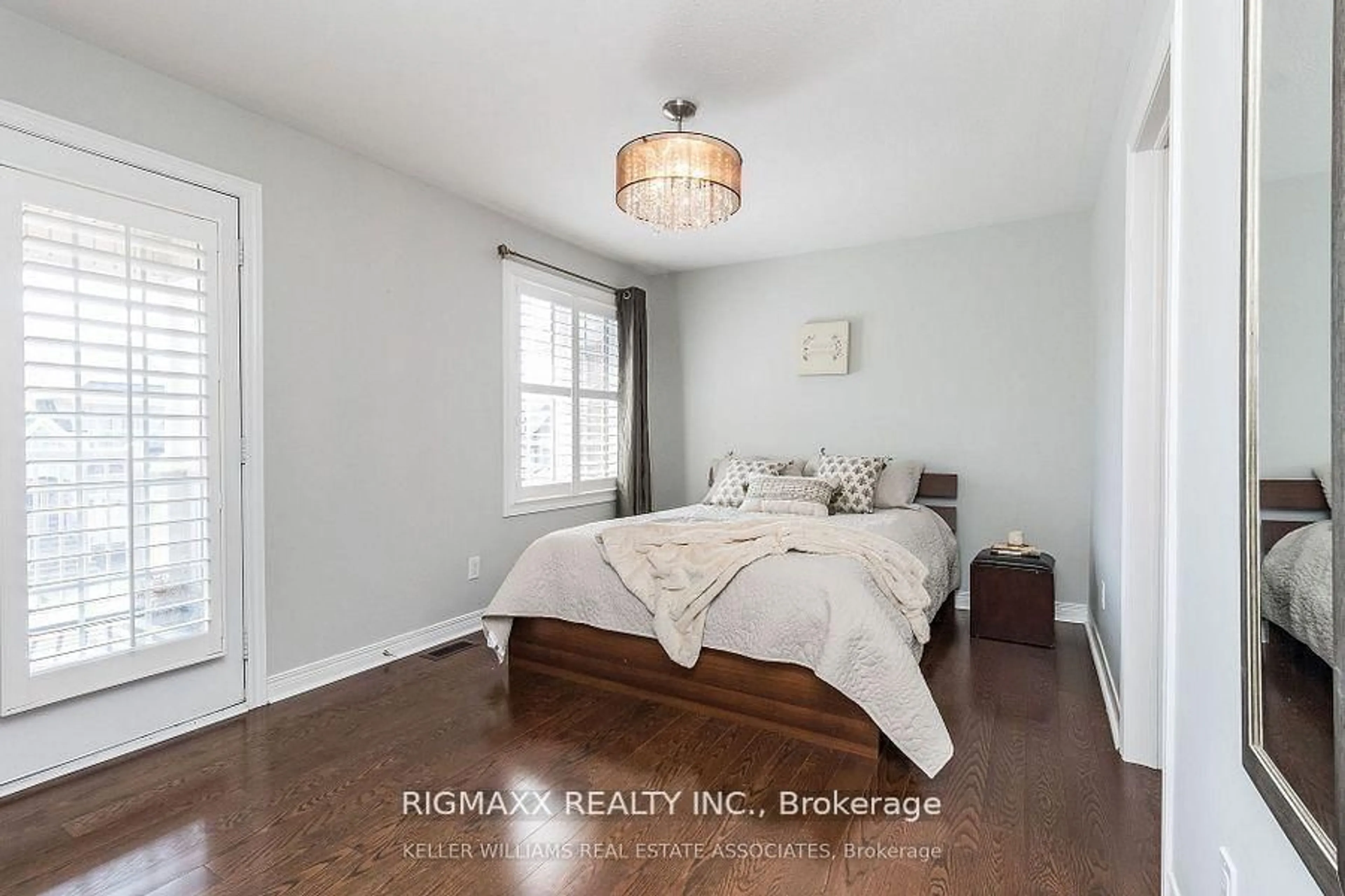 Bedroom with bed, wood/laminate floor for 7 Villanova Rd, Brampton Ontario L6Y 2Z4