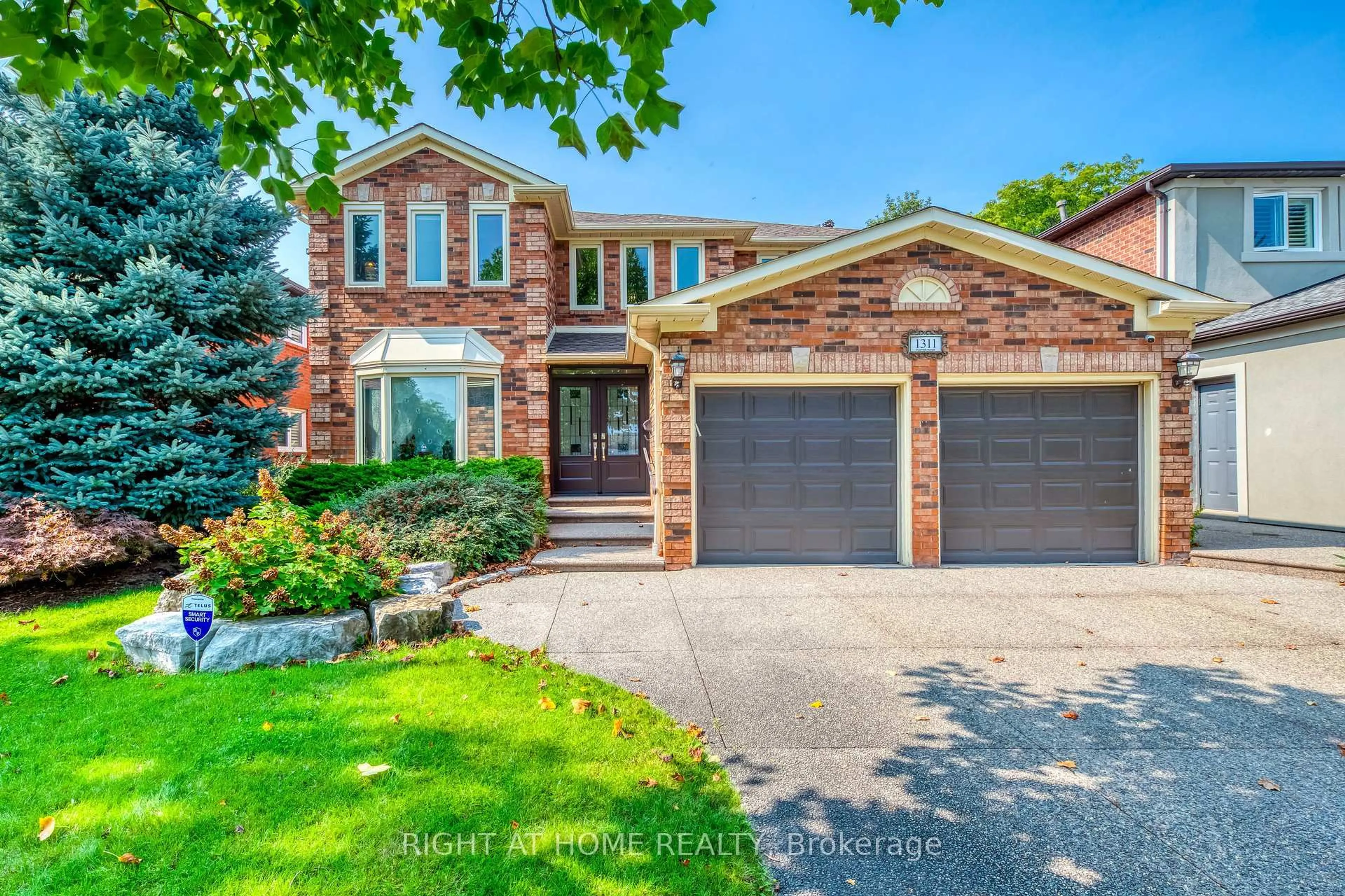 Home with brick exterior material, street for 1311 Playter Pl, Oakville Ontario L6M 2V1