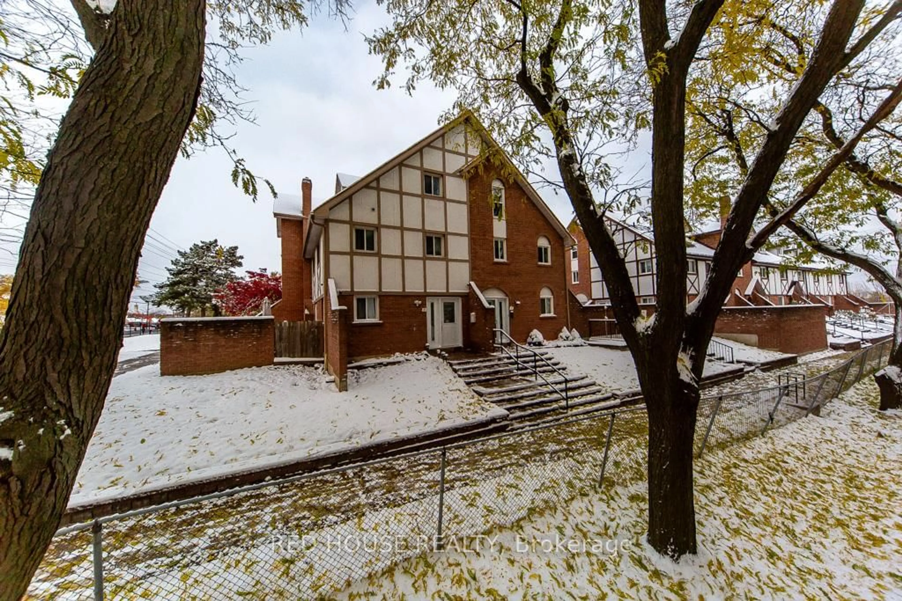 Home with brick exterior material, street for 87 Irwin Rd #2, Toronto Ontario M9W 5W1