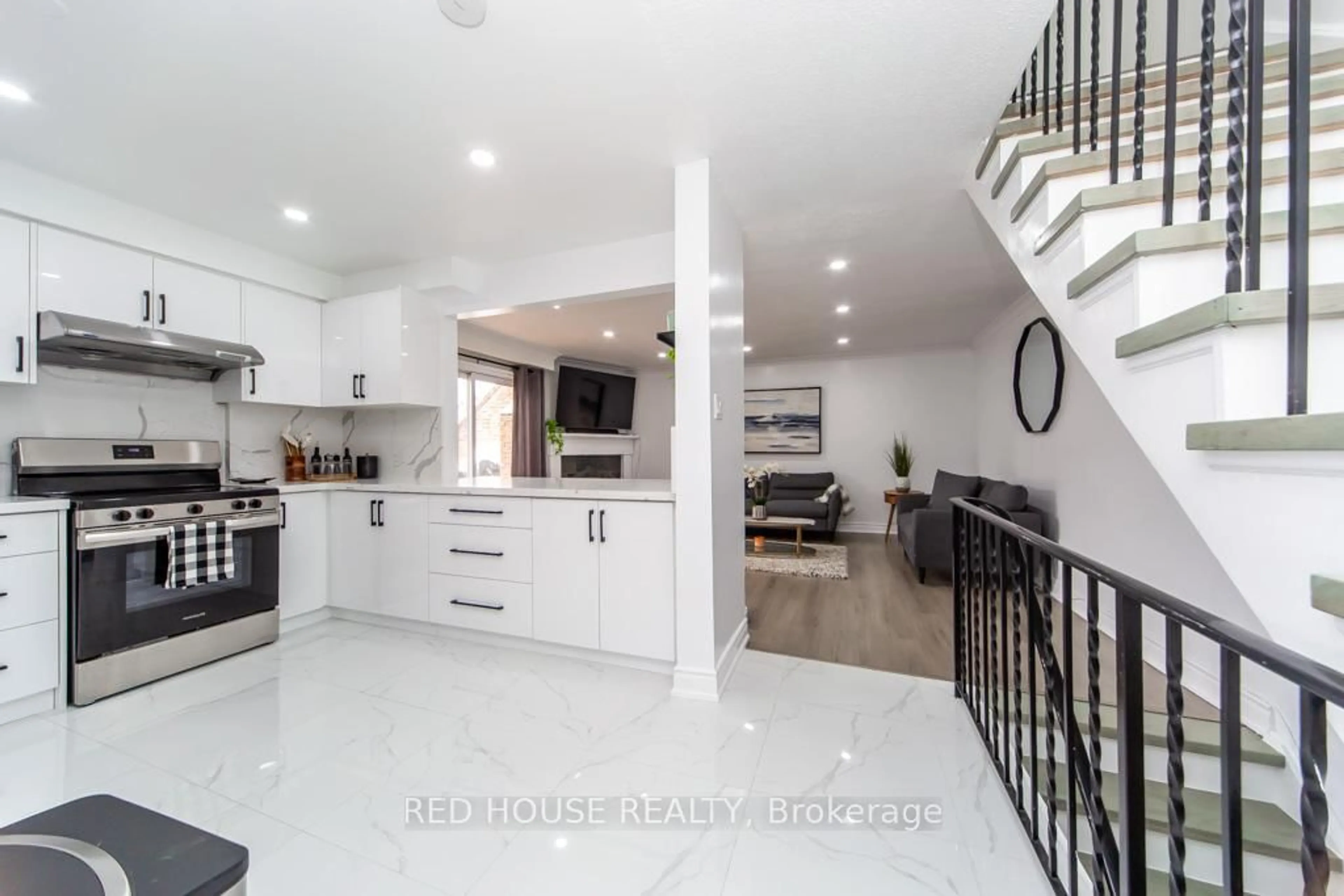 Open concept kitchen, ceramic/tile floor for 87 Irwin Rd #2, Toronto Ontario M9W 5W1