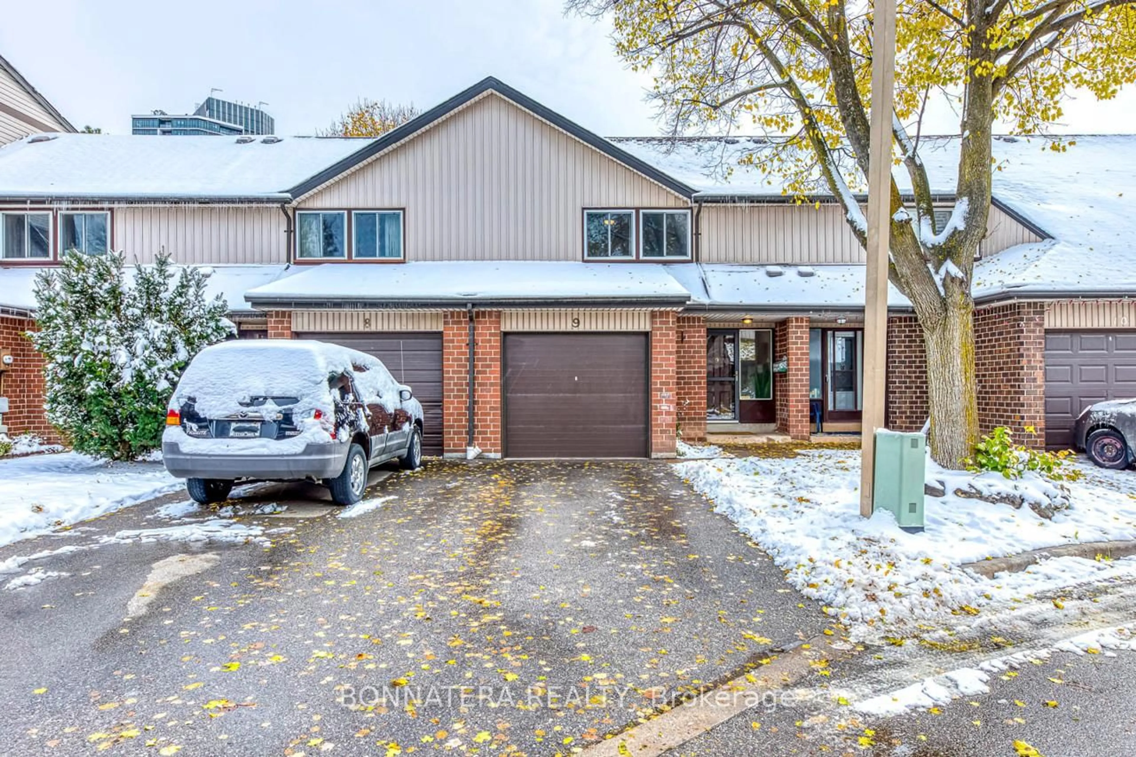 Home with brick exterior material, street for 318 Laurier Ave #9, Milton Ontario L9T 3M9