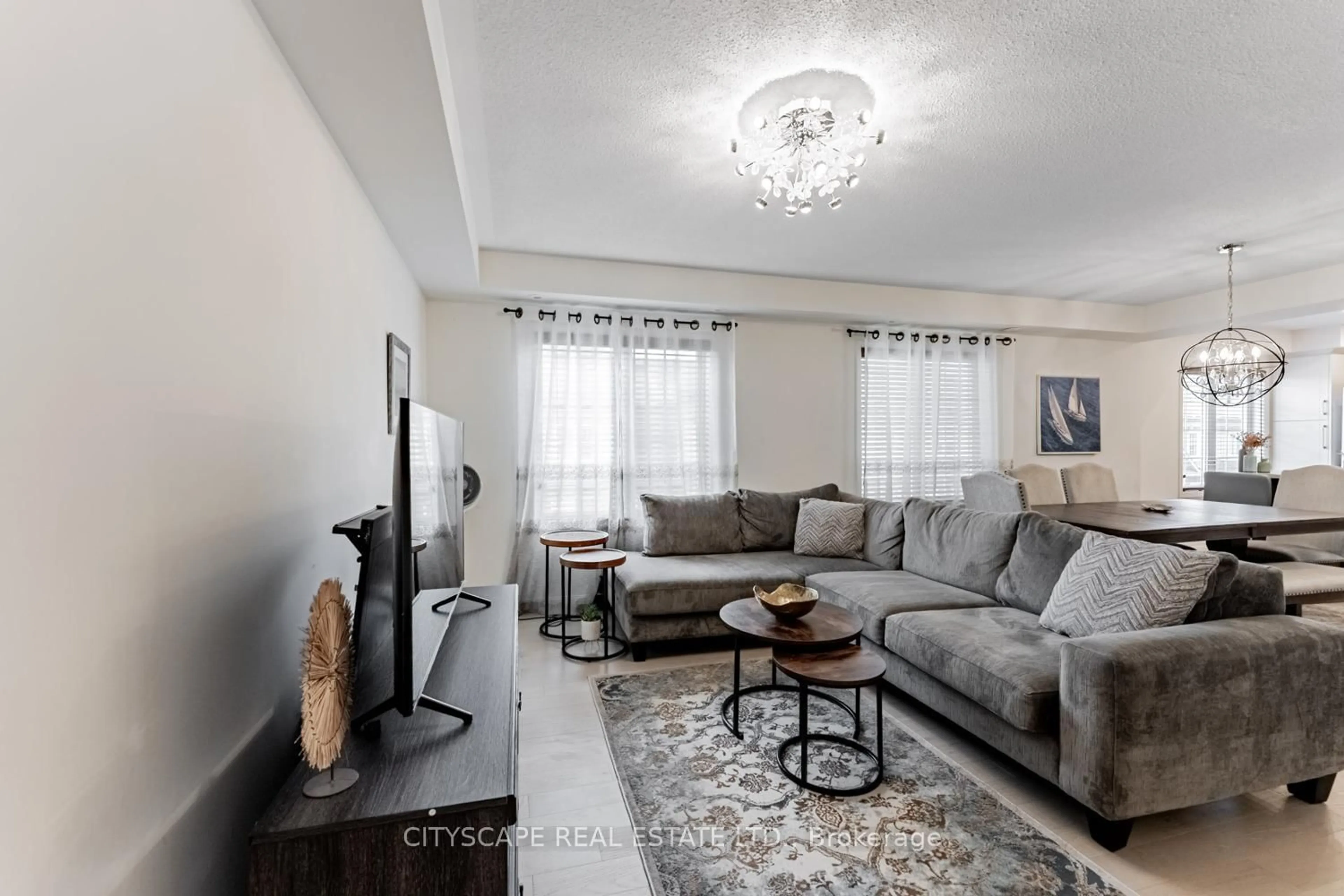 Living room with furniture, unknown for 700 Neighbourhood Circ #3, Mississauga Ontario L5B 0A6