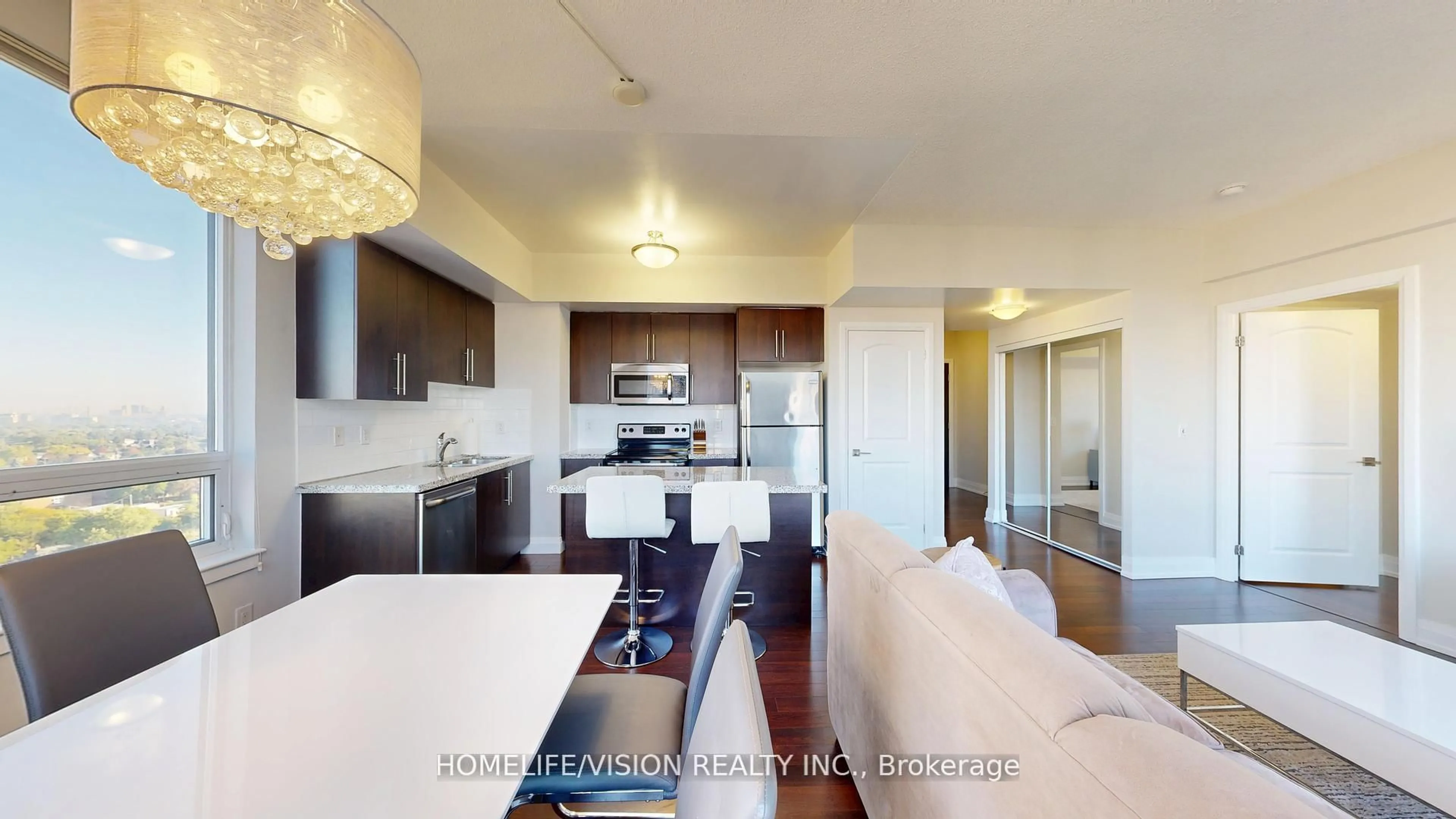 Open concept kitchen, wood/laminate floor for 1060 Sheppard Ave #1504, Toronto Ontario M3J 0G7