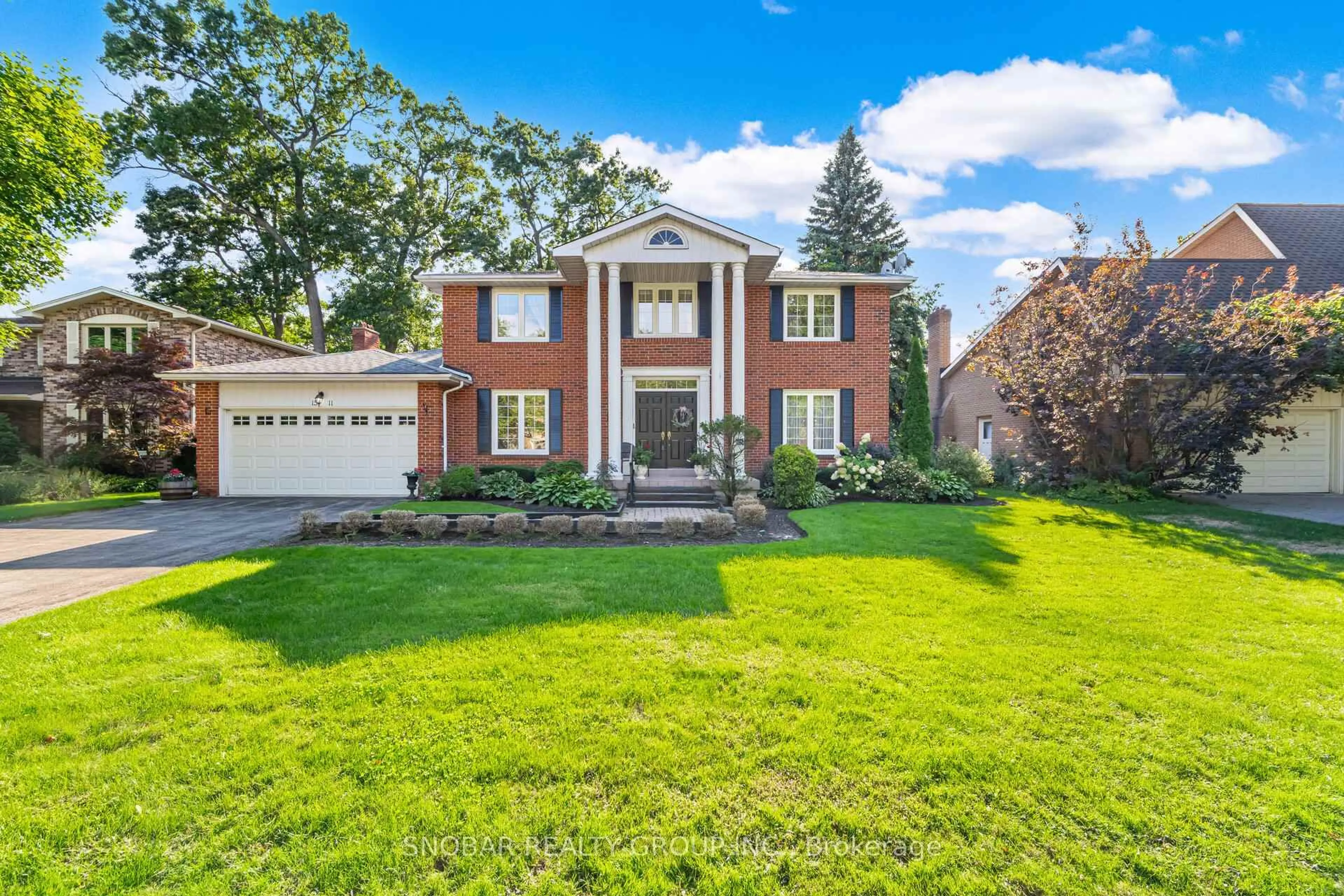 Home with brick exterior material, street for 1511 Ballyclare Dr, Mississauga Ontario L5C 1J4