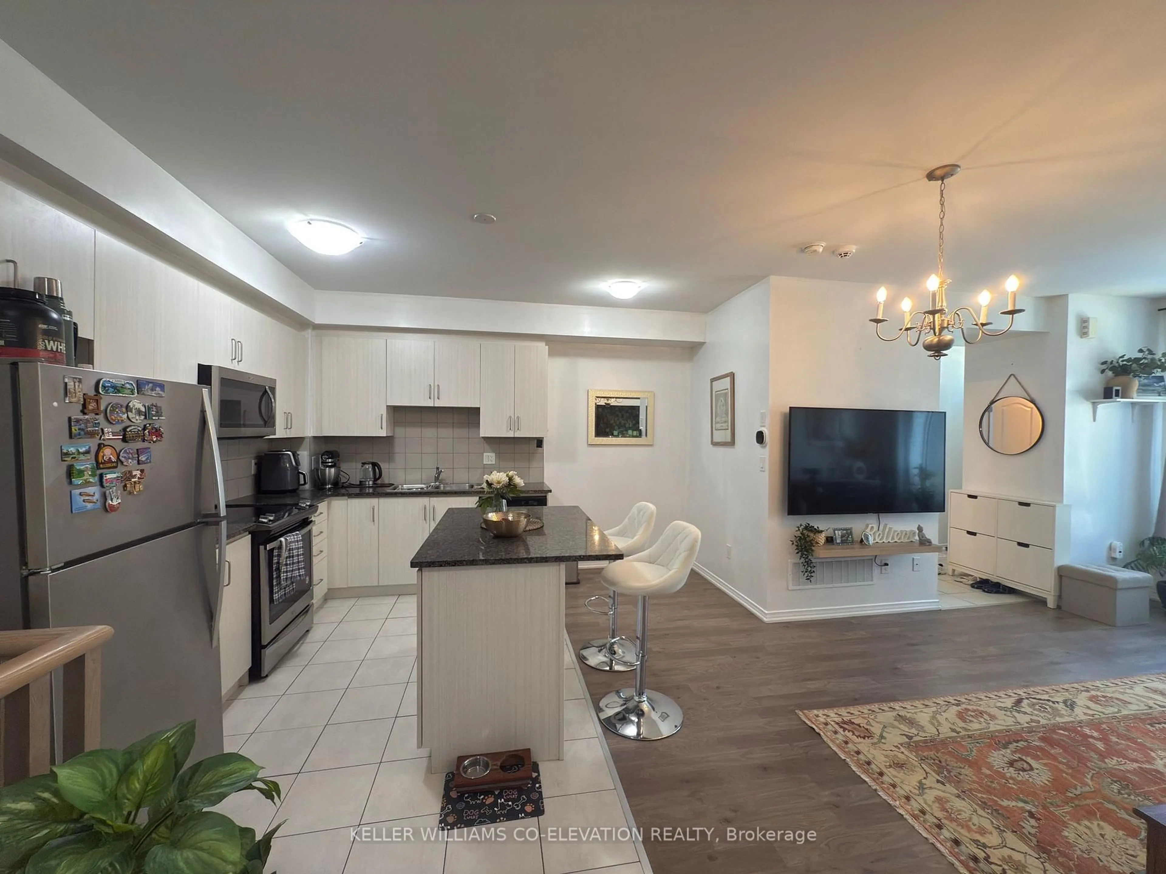 Open concept kitchen, unknown for 11 Applewood Lane #112, Toronto Ontario M9C 2Z7