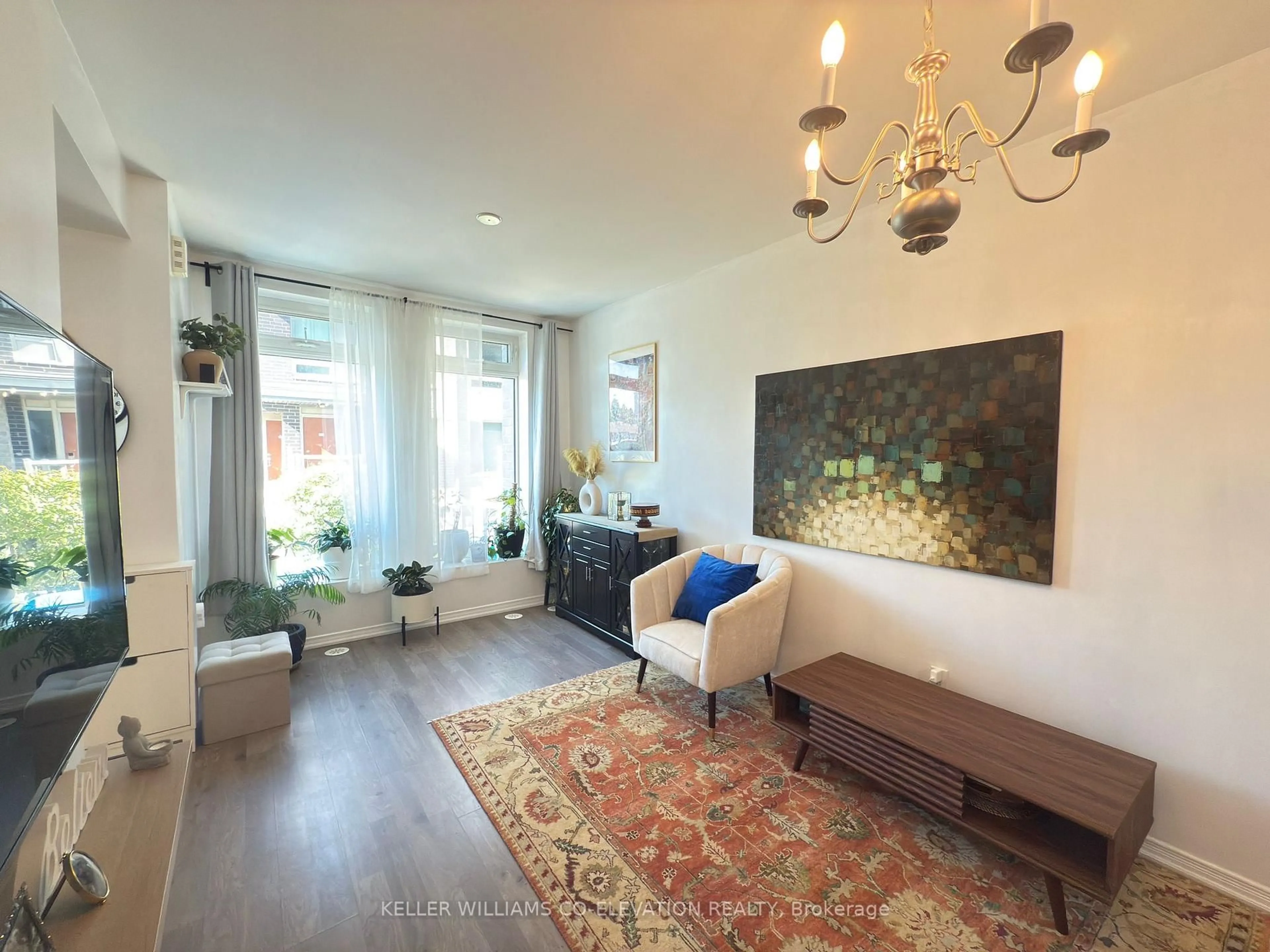 Living room with furniture, unknown for 11 Applewood Lane #112, Toronto Ontario M9C 2Z7