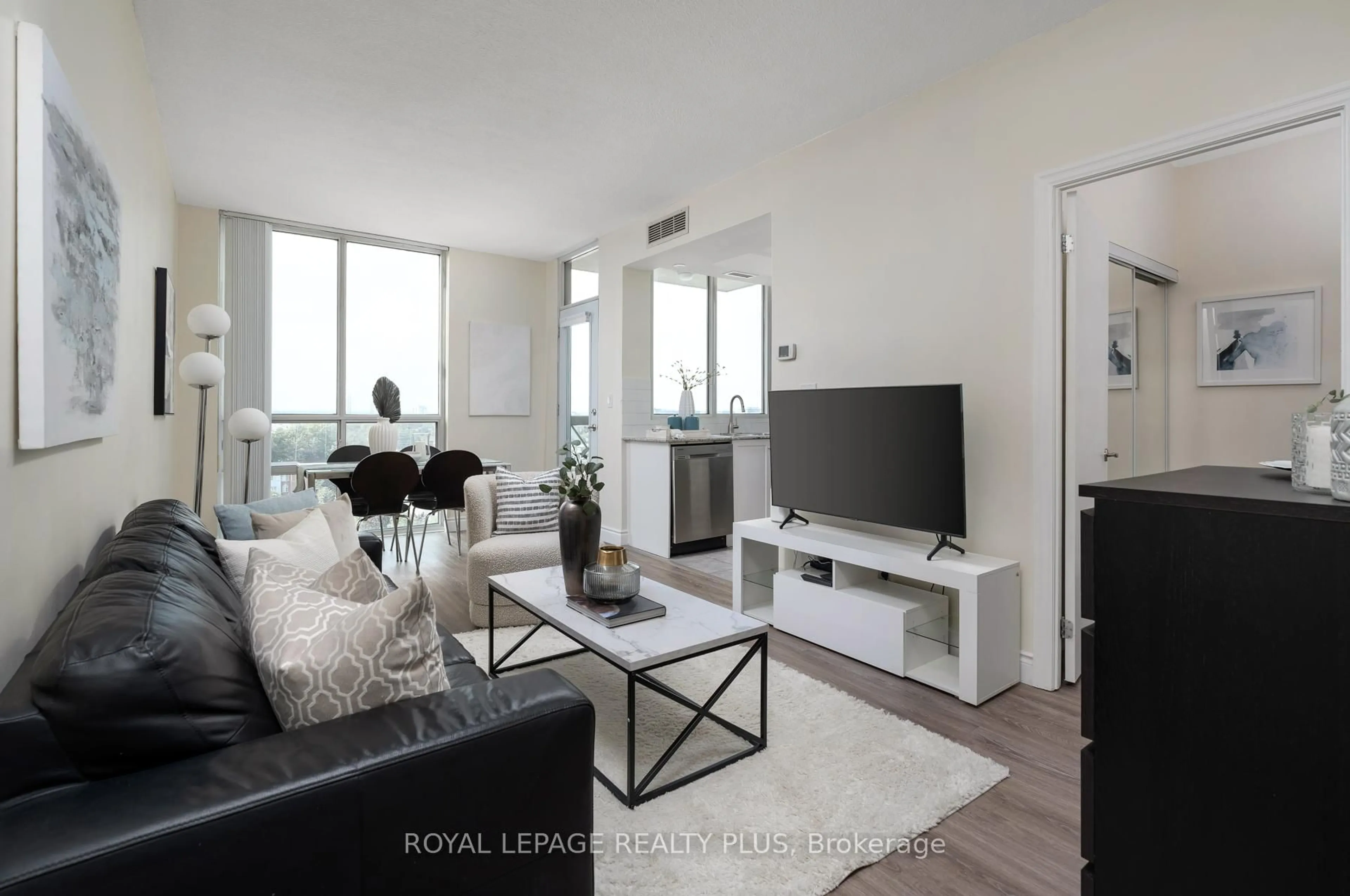 Living room with furniture, unknown for 1359 Rathburn Rd #903, Mississauga Ontario L4W 5P7