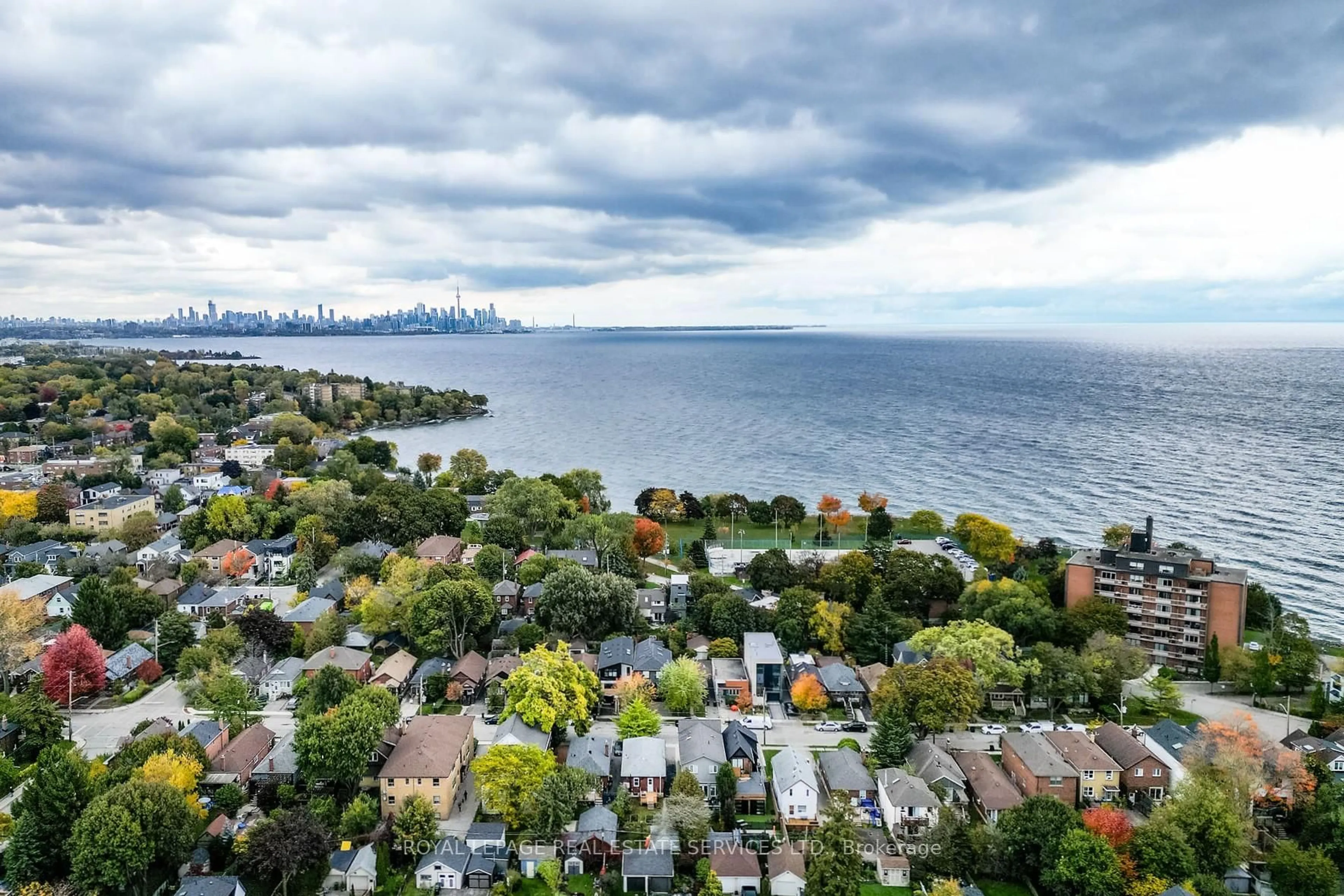 A pic from outside/outdoor area/front of a property/back of a property/a pic from drone, water/lake/river/ocean view for 44 Fourth St, Toronto Ontario M8V 2Y3