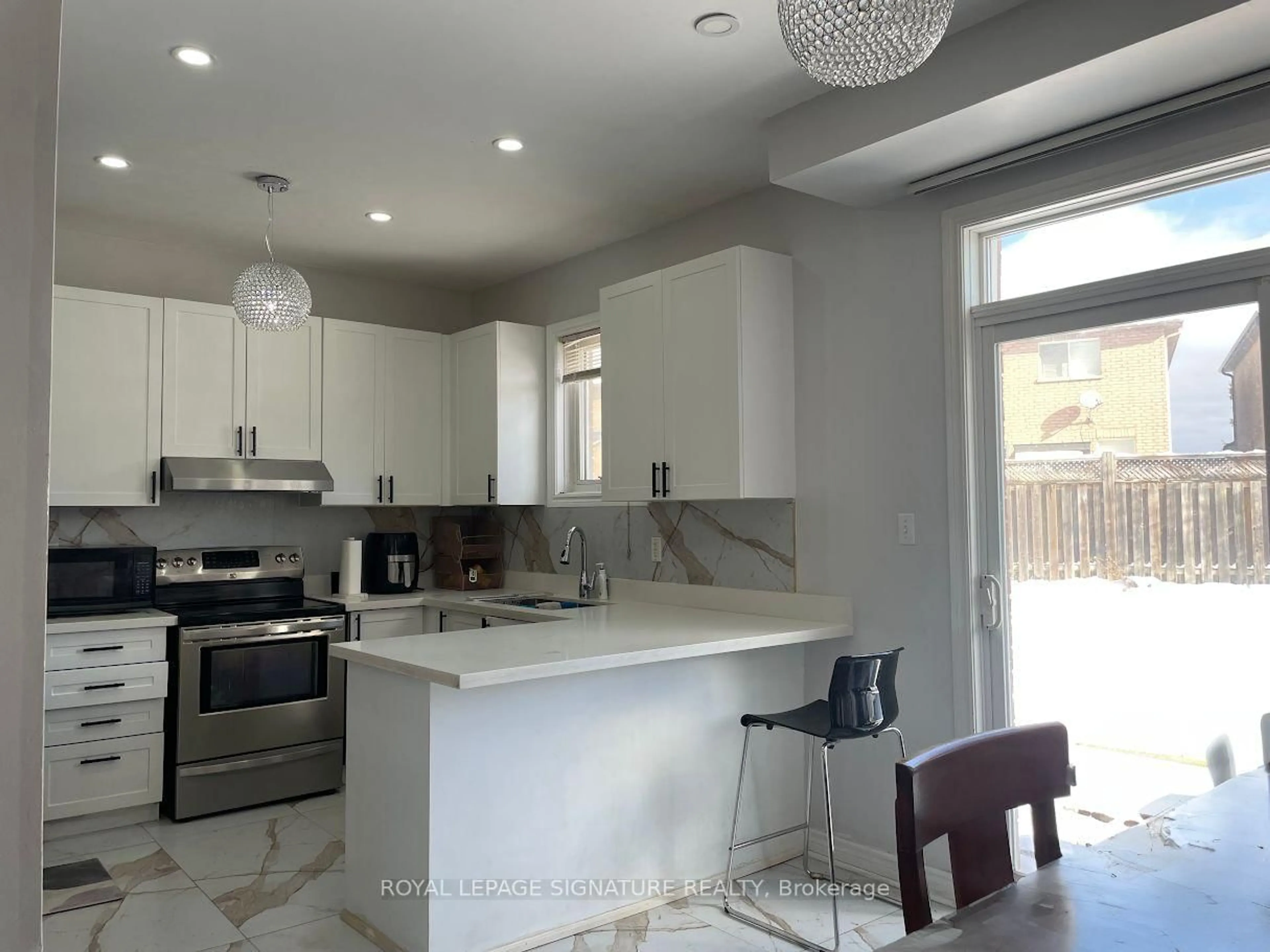 Open concept kitchen, ceramic/tile floor for 26 Mario St, Brampton Ontario L6P 1N1