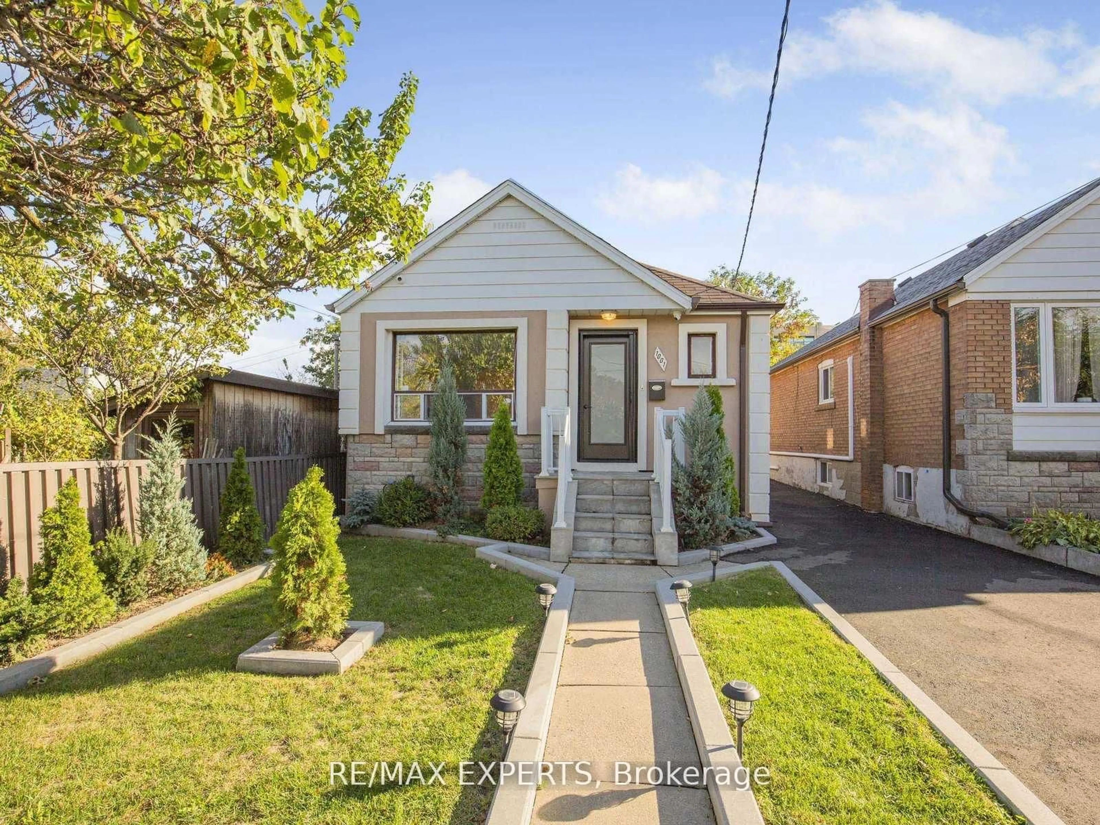 Home with brick exterior material, street for 1001 Castlefield Ave, Toronto Ontario M6B 1E4