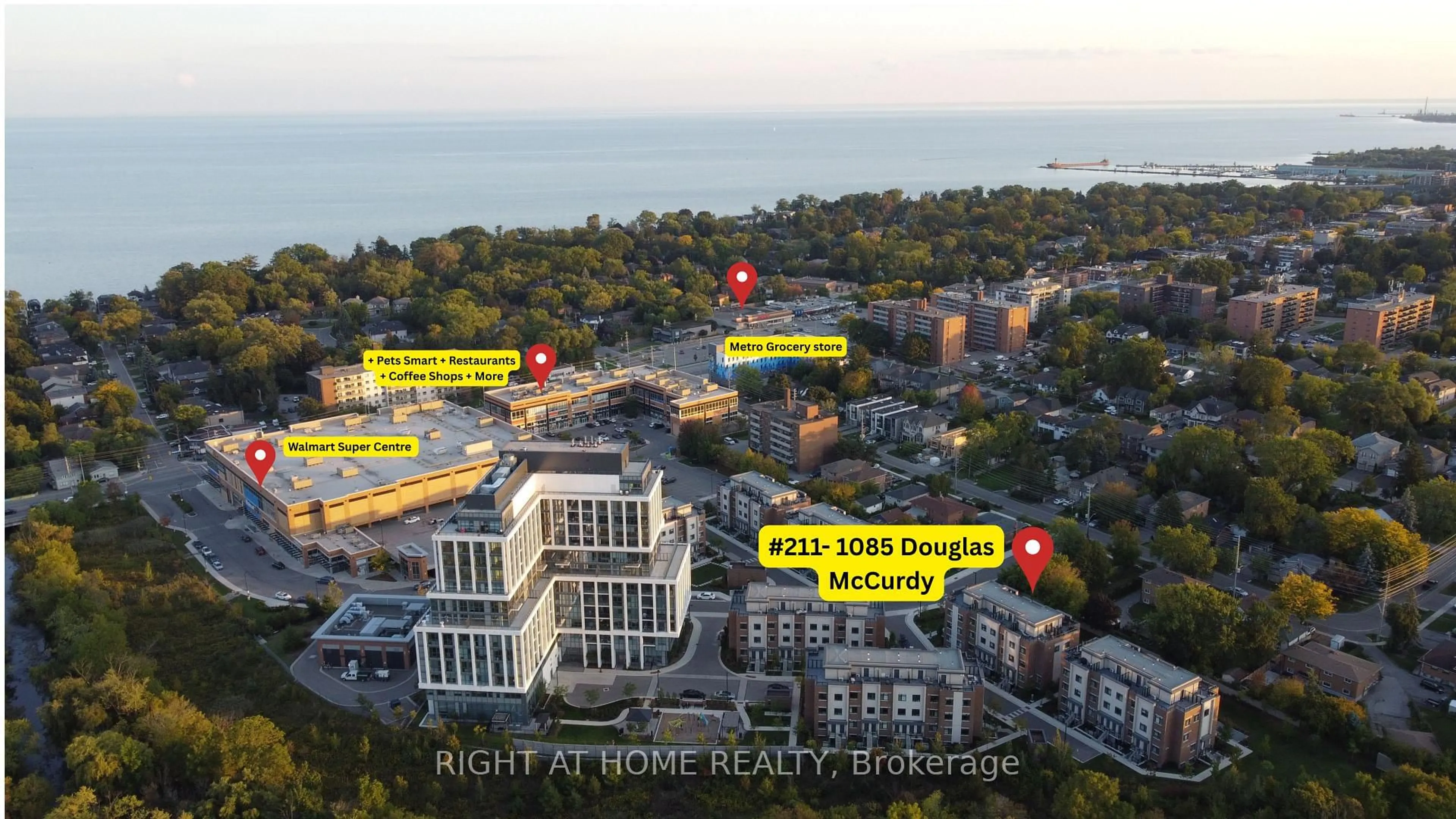 A pic from outside/outdoor area/front of a property/back of a property/a pic from drone, city buildings view from balcony for 1085 Douglas McCurdy Common #211, Mississauga Ontario L5G 0C6