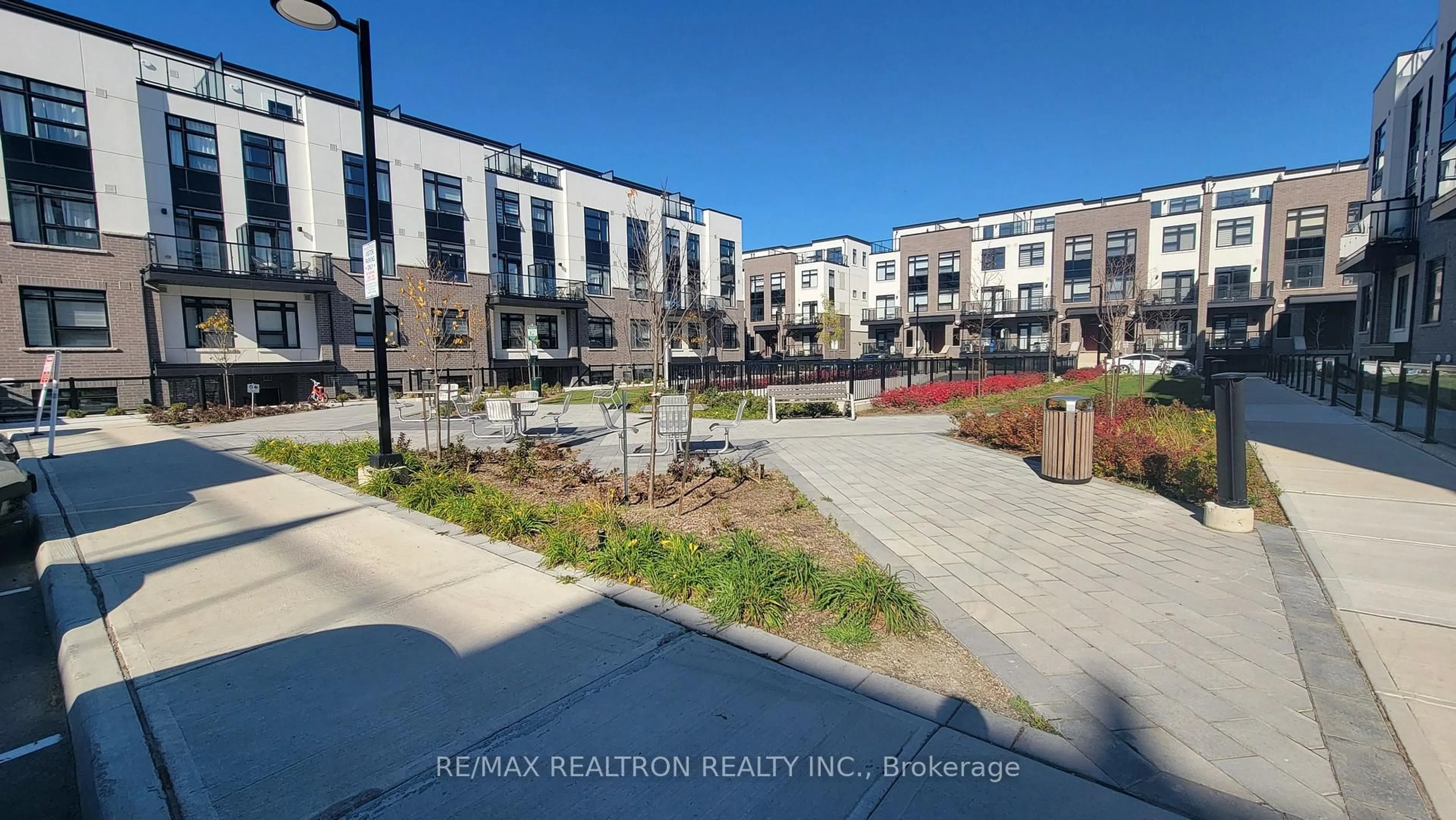 A pic from outside/outdoor area/front of a property/back of a property/a pic from drone, street for 1589 Rose Way #110, Milton Ontario L9E 1N4