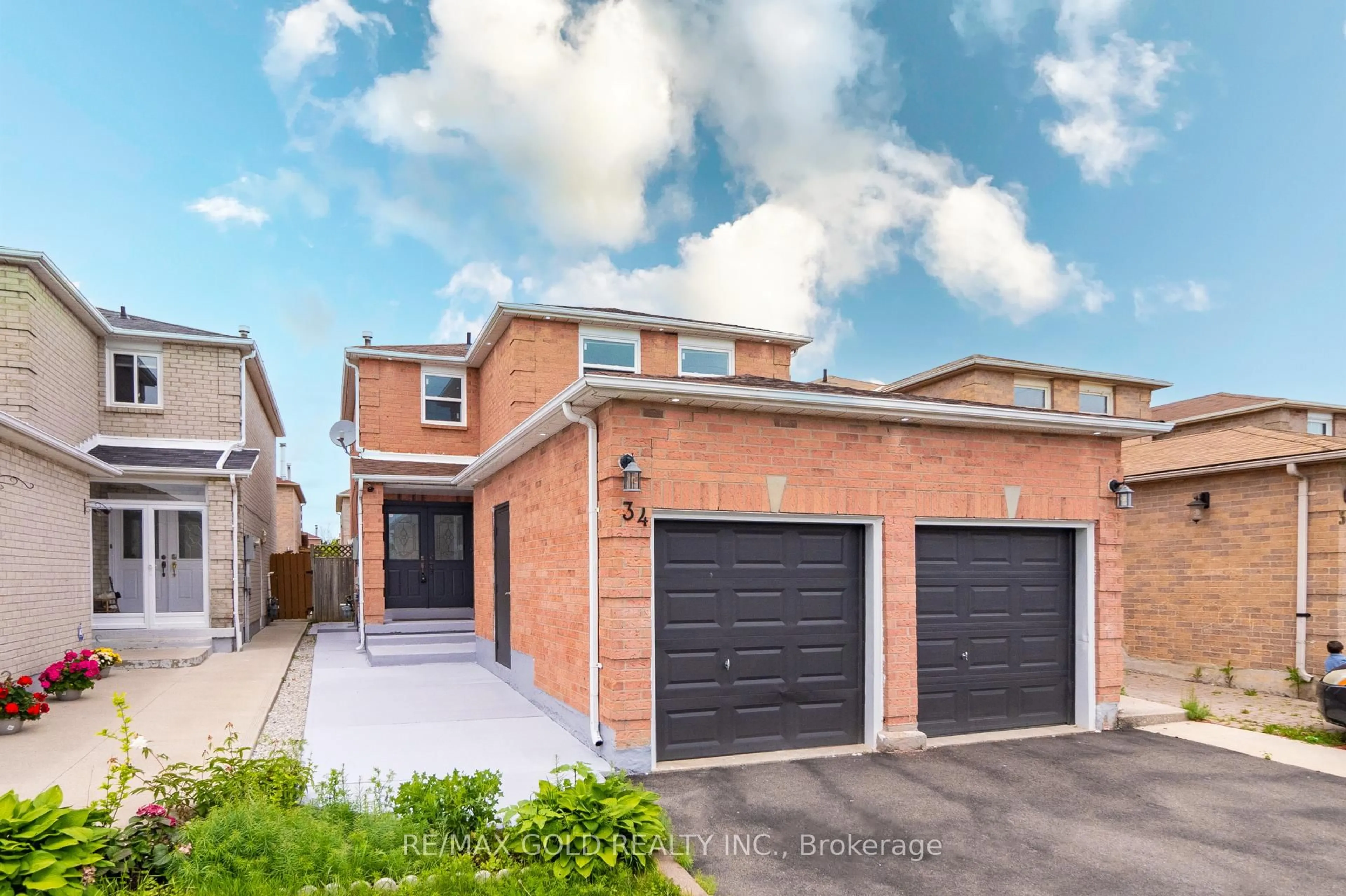 Home with brick exterior material, street for 34 Meadowlark Dr, Brampton Ontario L6Y 4A7