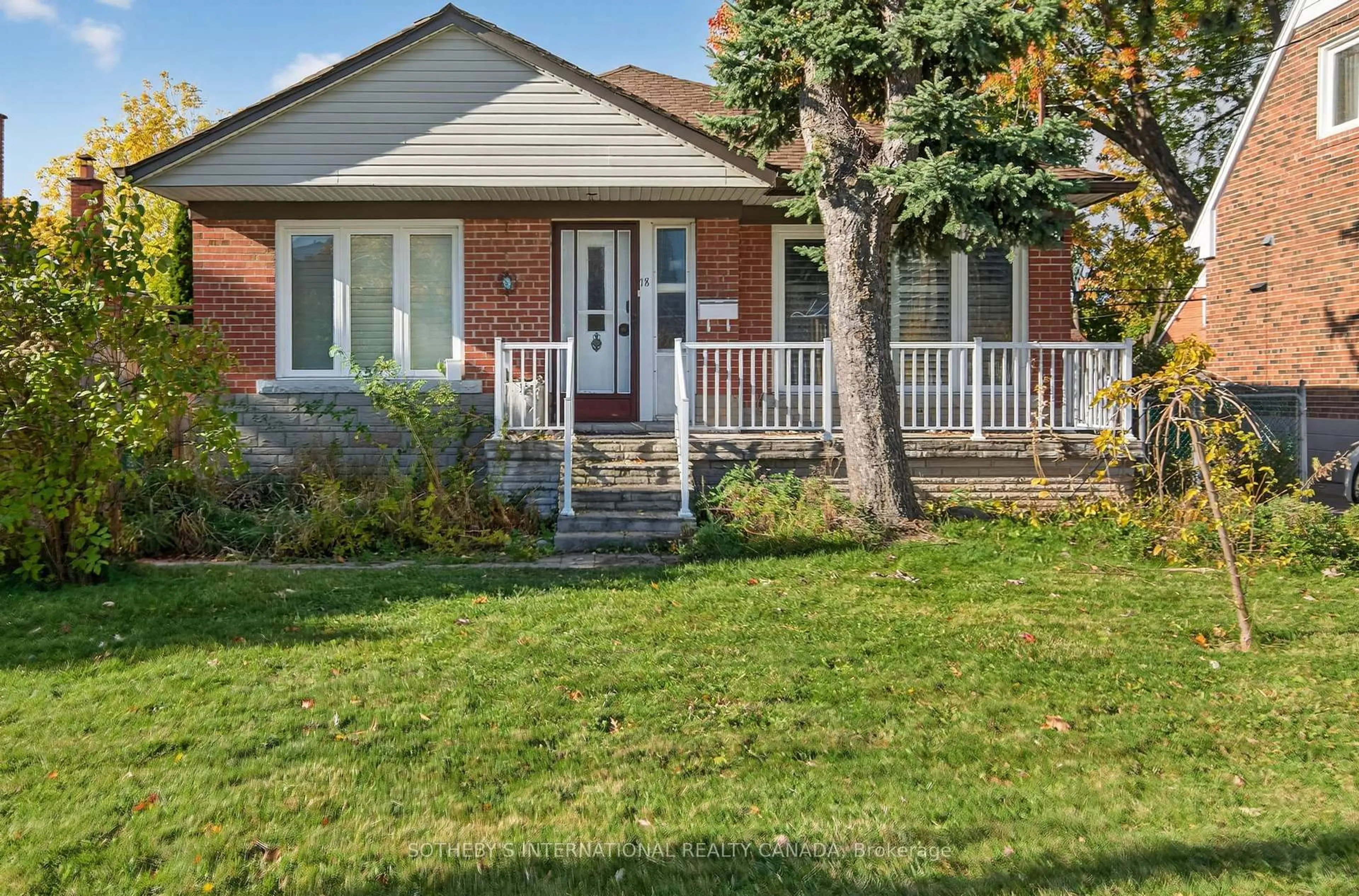 Home with brick exterior material, street for 18 Rossburn Dr, Toronto Ontario M9C 2P6