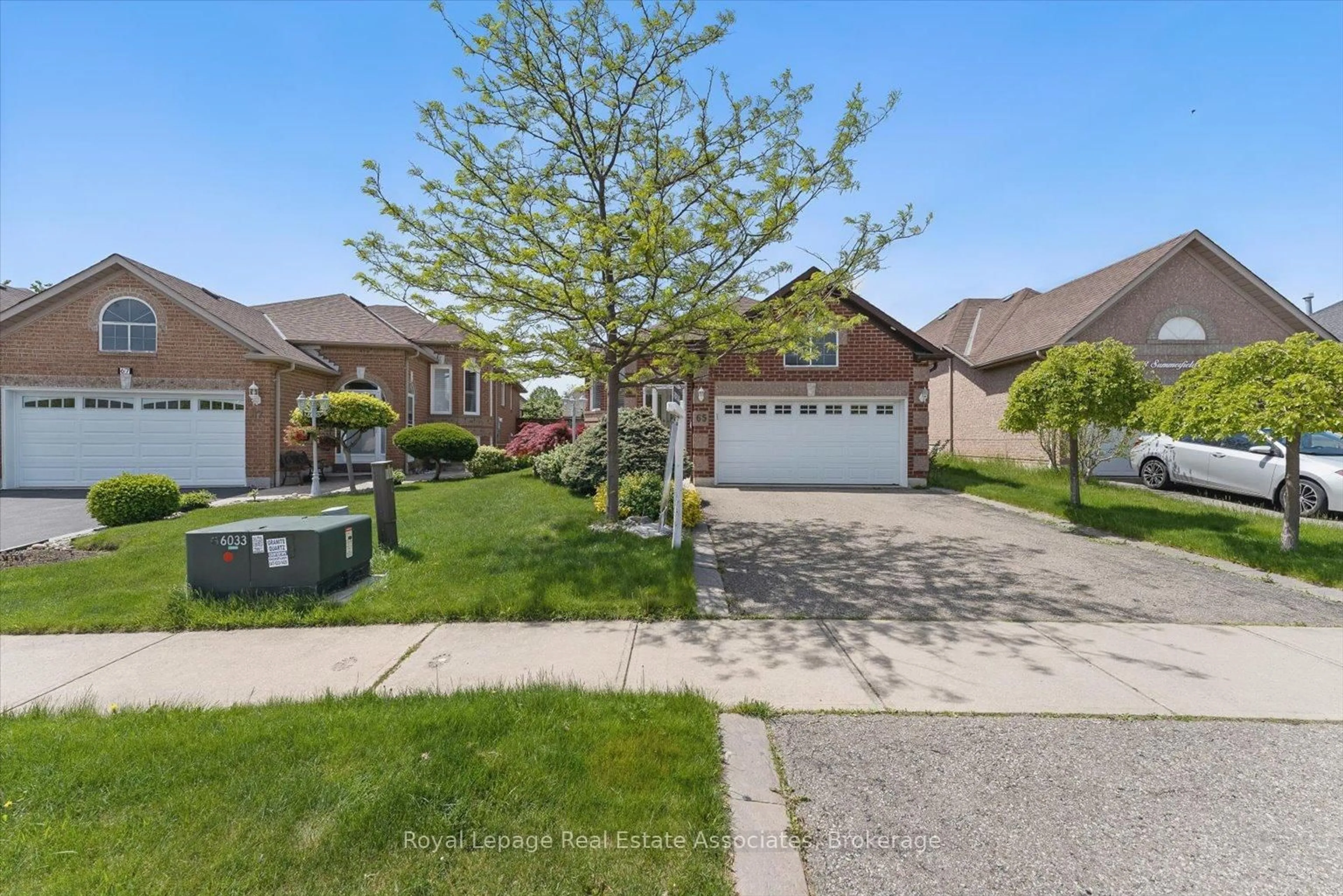 A pic from outside/outdoor area/front of a property/back of a property/a pic from drone, street for 65 Summerfield Cres, Brampton Ontario L6X 4L2