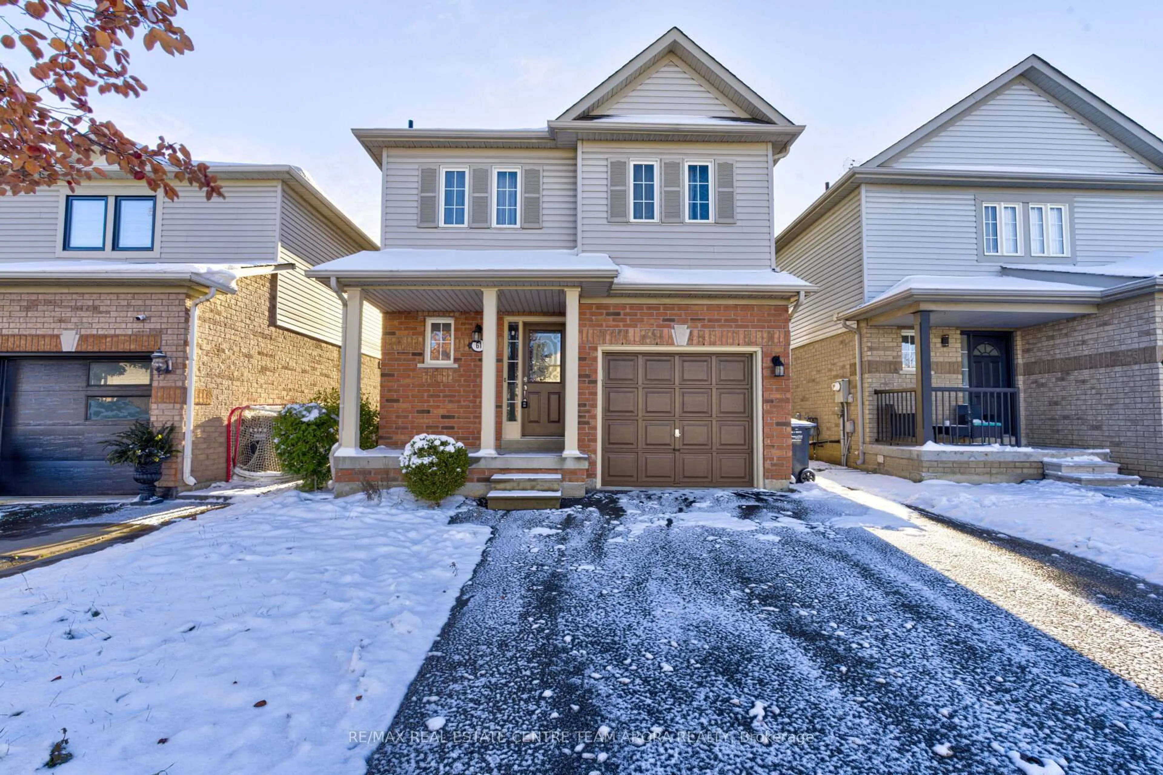 Home with brick exterior material, street for 61 Ridgemore Cres, Brampton Ontario L7A 2L5