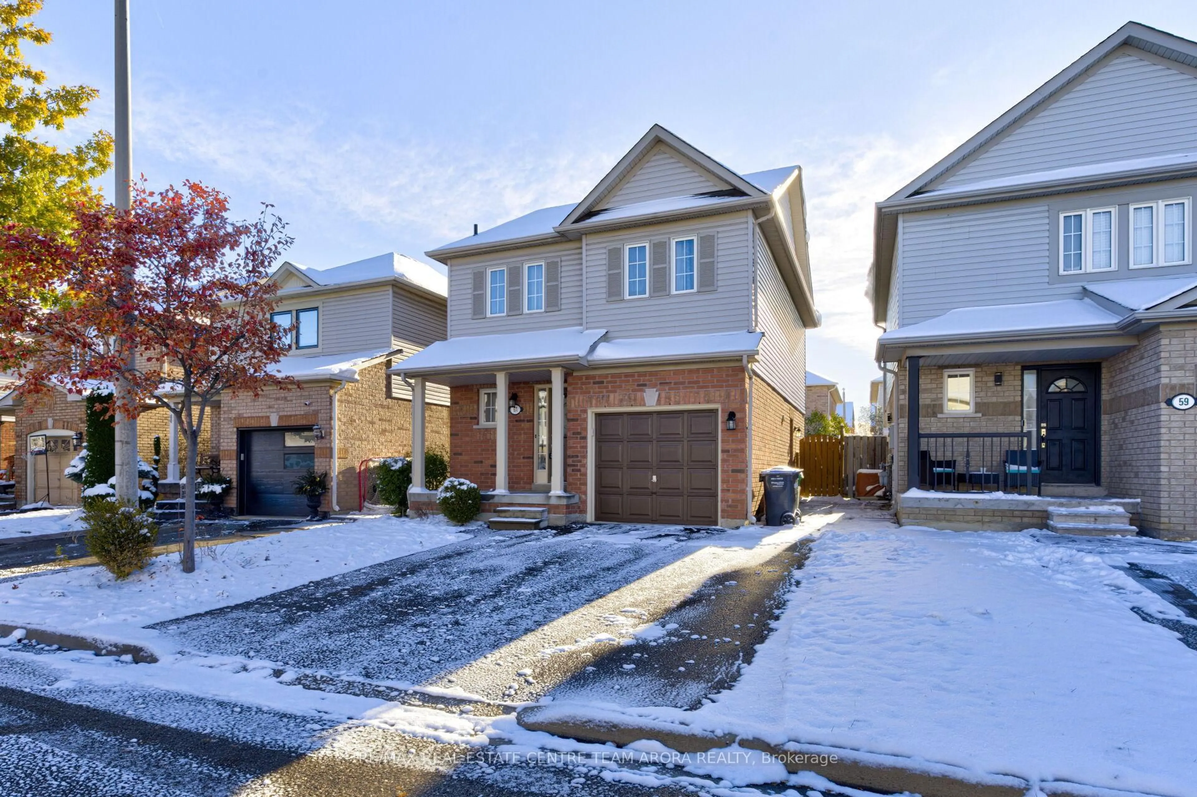 Home with brick exterior material, street for 61 Ridgemore Cres, Brampton Ontario L7A 2L5
