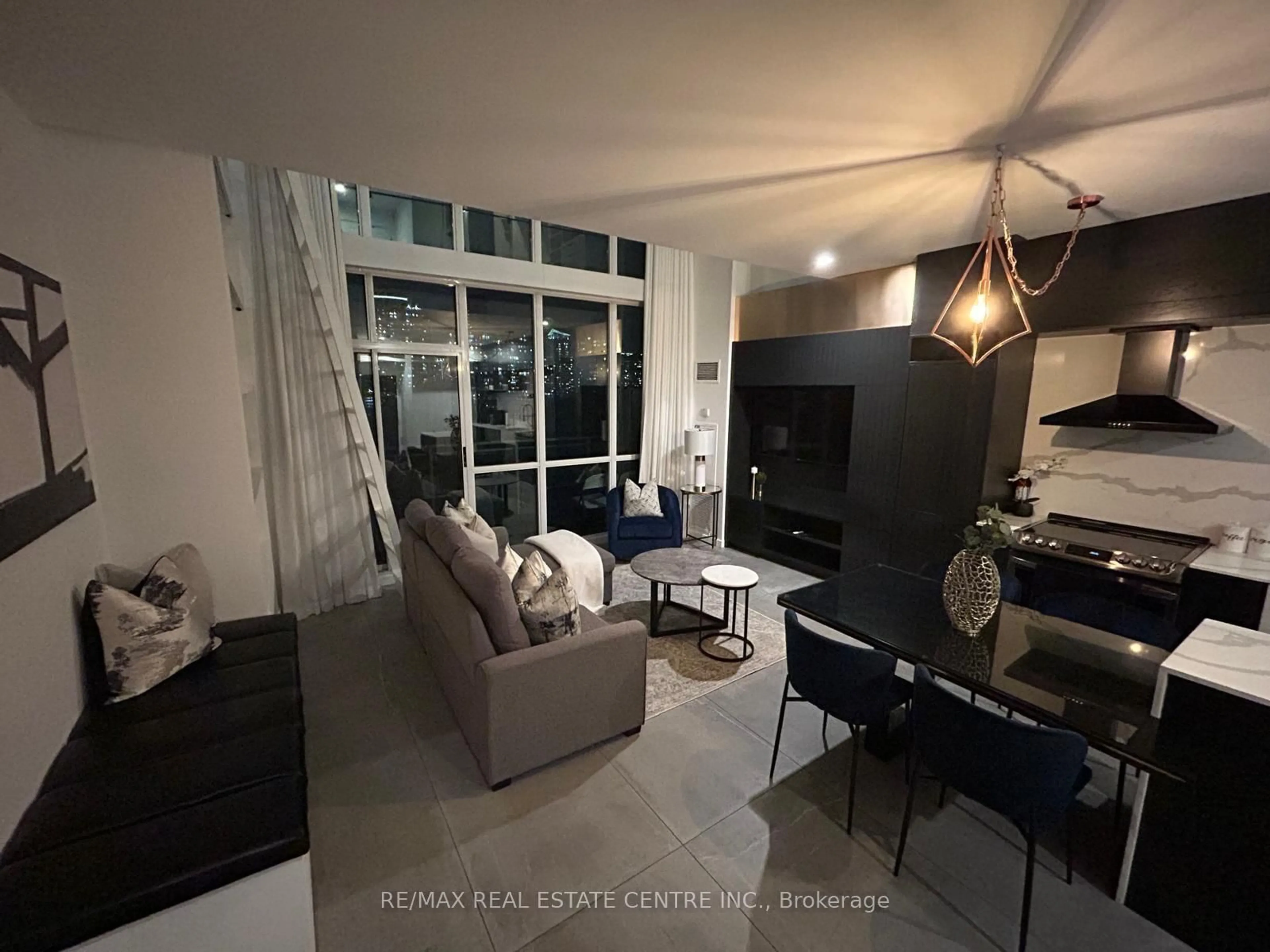 Living room with furniture, unknown for 220 Burnhamthorpe Rd #503, Mississauga Ontario L5B 4N4