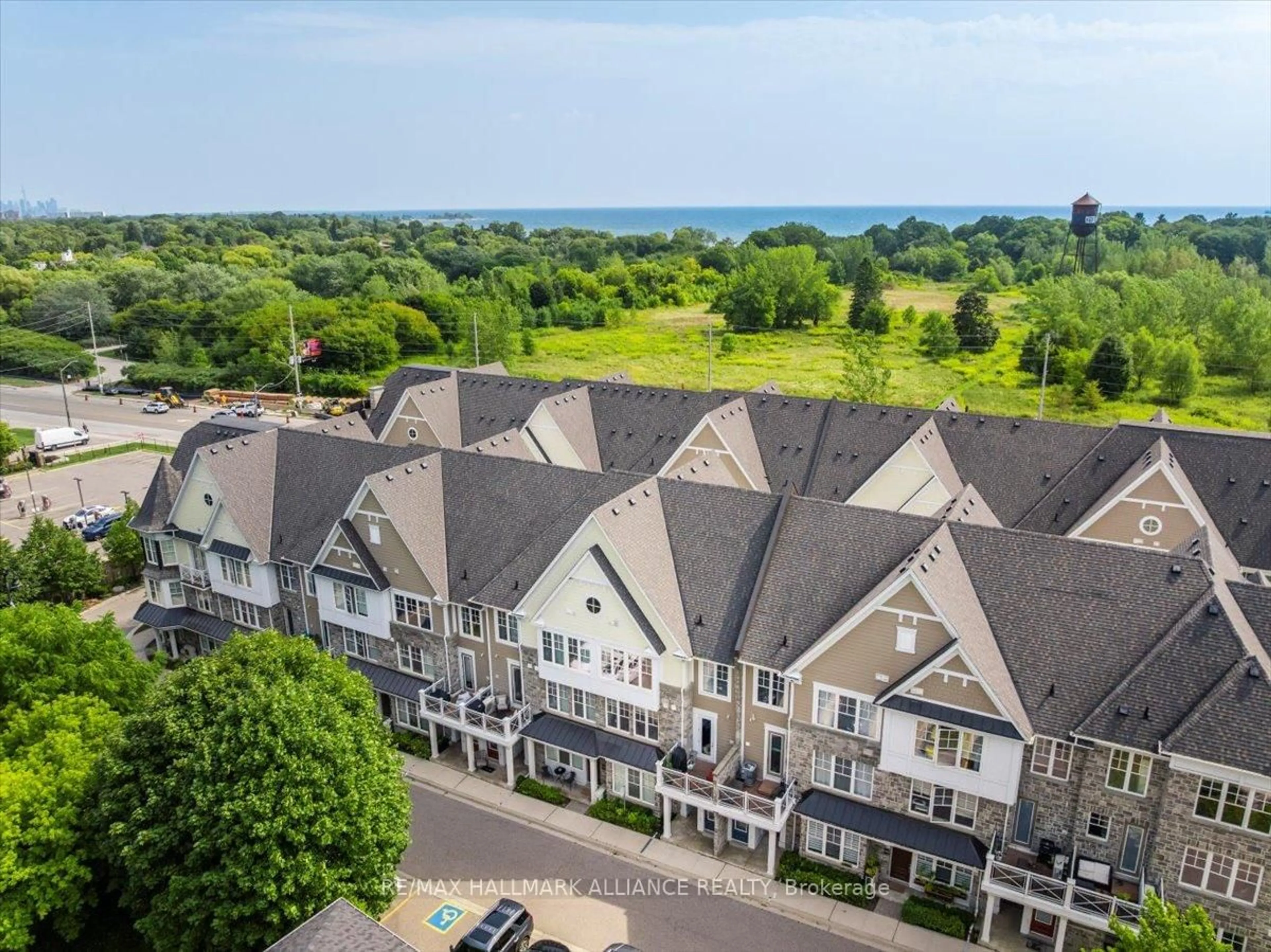 A pic from outside/outdoor area/front of a property/back of a property/a pic from drone, water/lake/river/ocean view for 1011 Deta Rd #701, Mississauga Ontario L5E 0A2