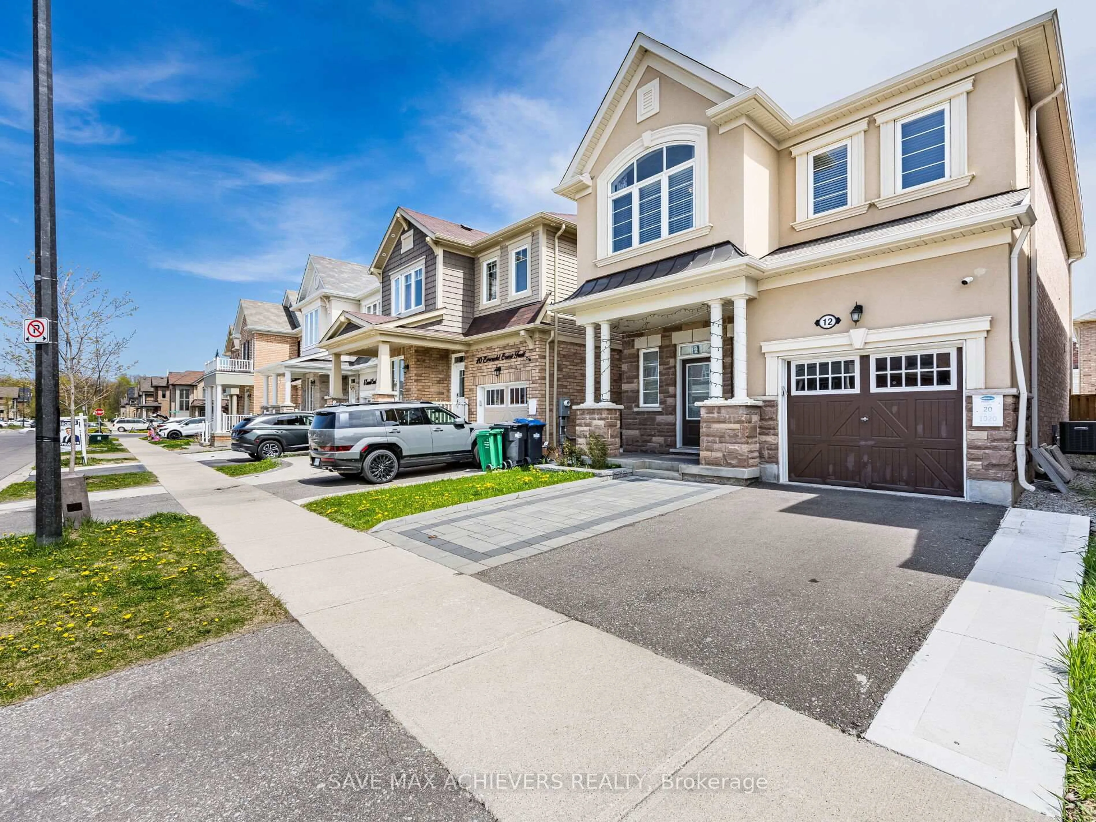 A pic from outside/outdoor area/front of a property/back of a property/a pic from drone, street for 12 Emerald Coast Tr, Brampton Ontario L7A 5A7