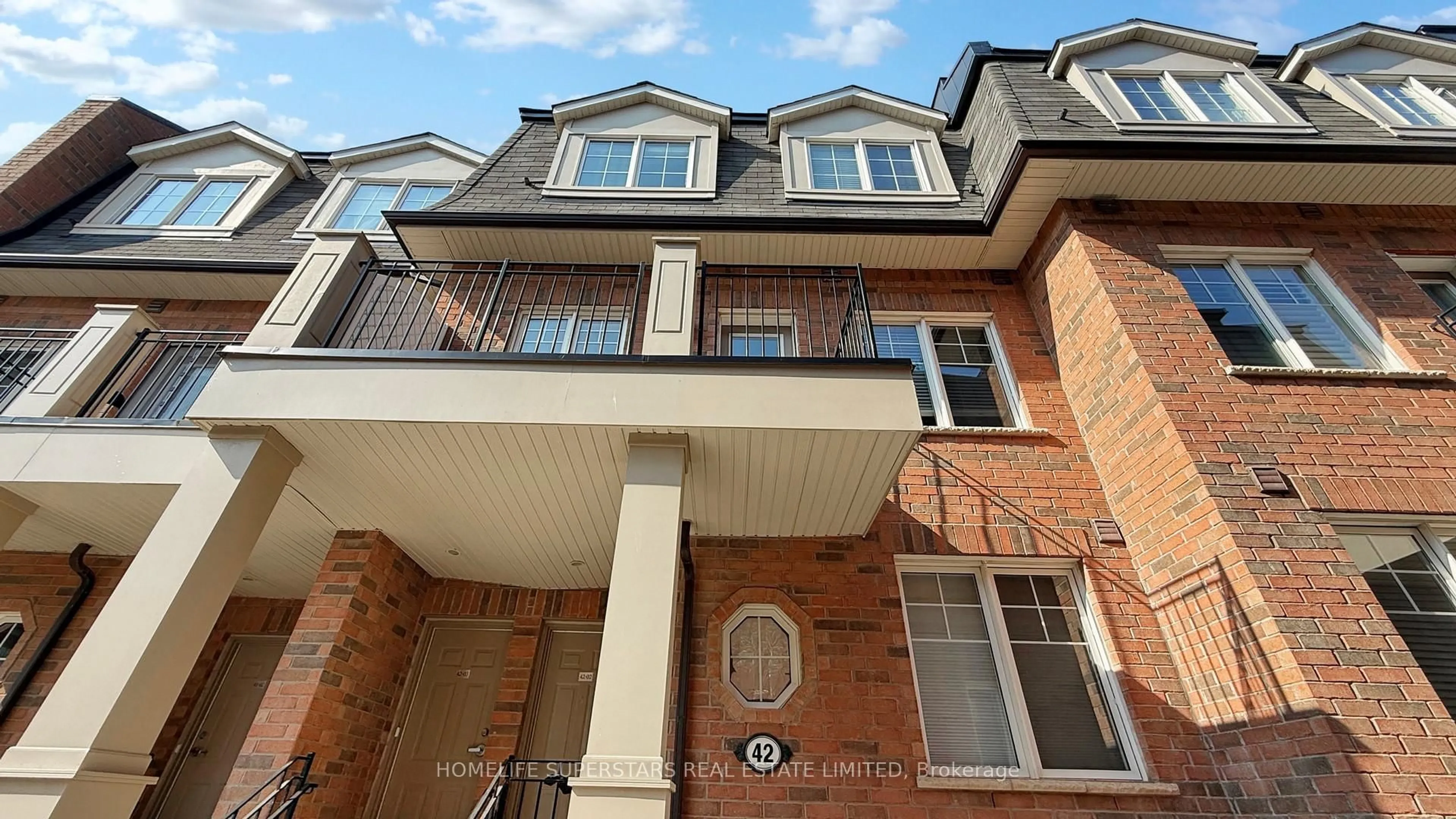 Home with brick exterior material, street for 2420 Baronwood Dr #42-02, Oakville Ontario L6M 0J7