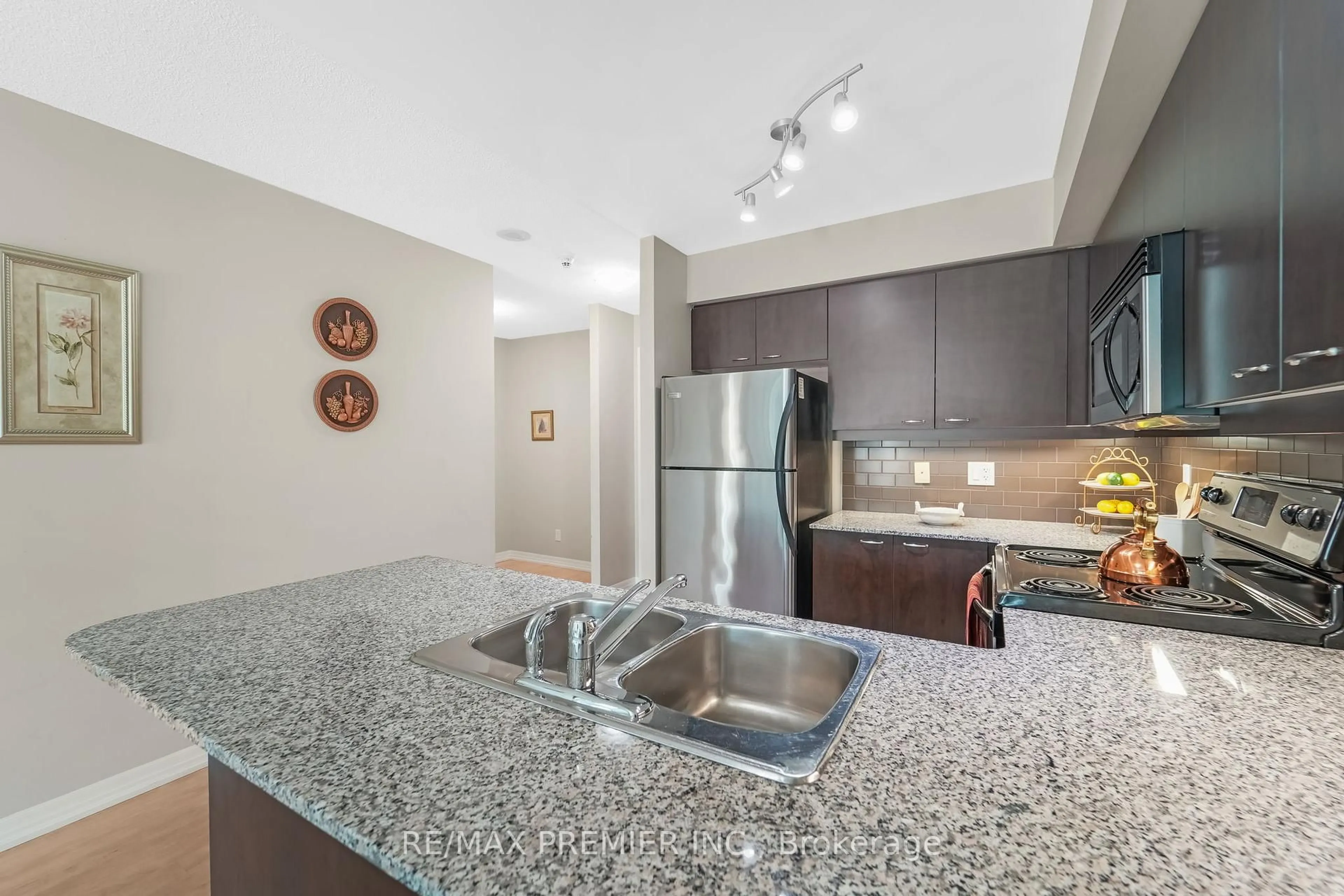 Open concept kitchen, unknown for 1403 Royal York Rd #216, Toronto Ontario M9P 0A1