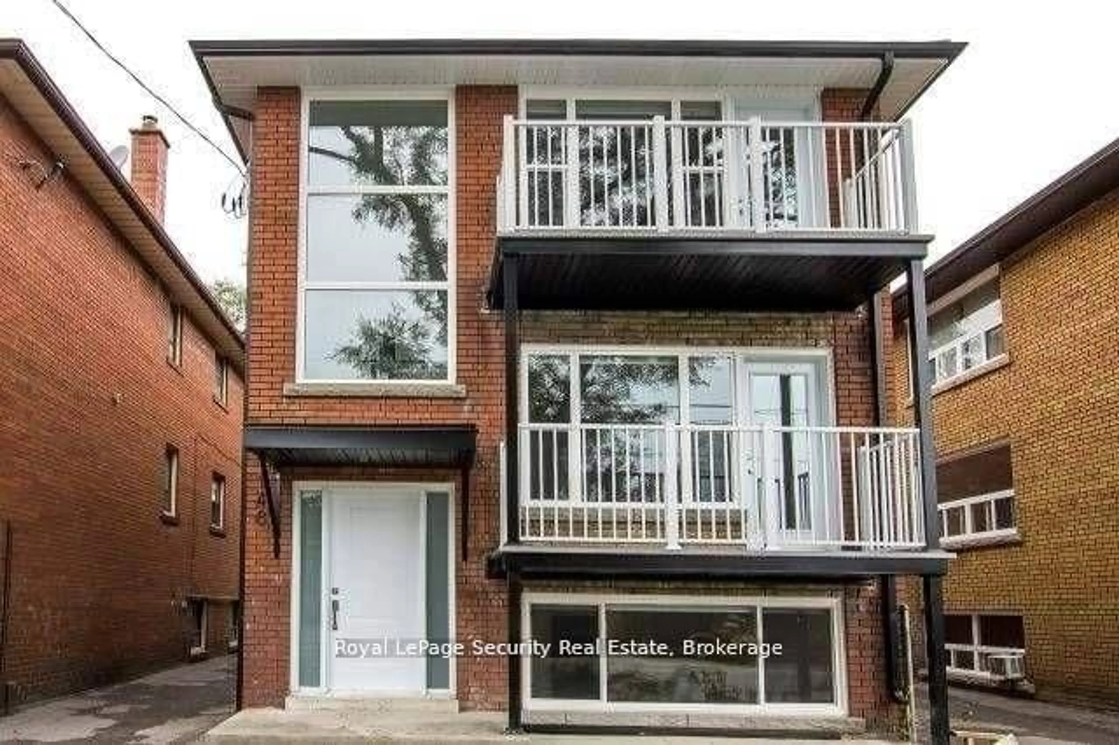 Home with brick exterior material, street for 148 Portland St, Toronto Ontario M8Y 1B2
