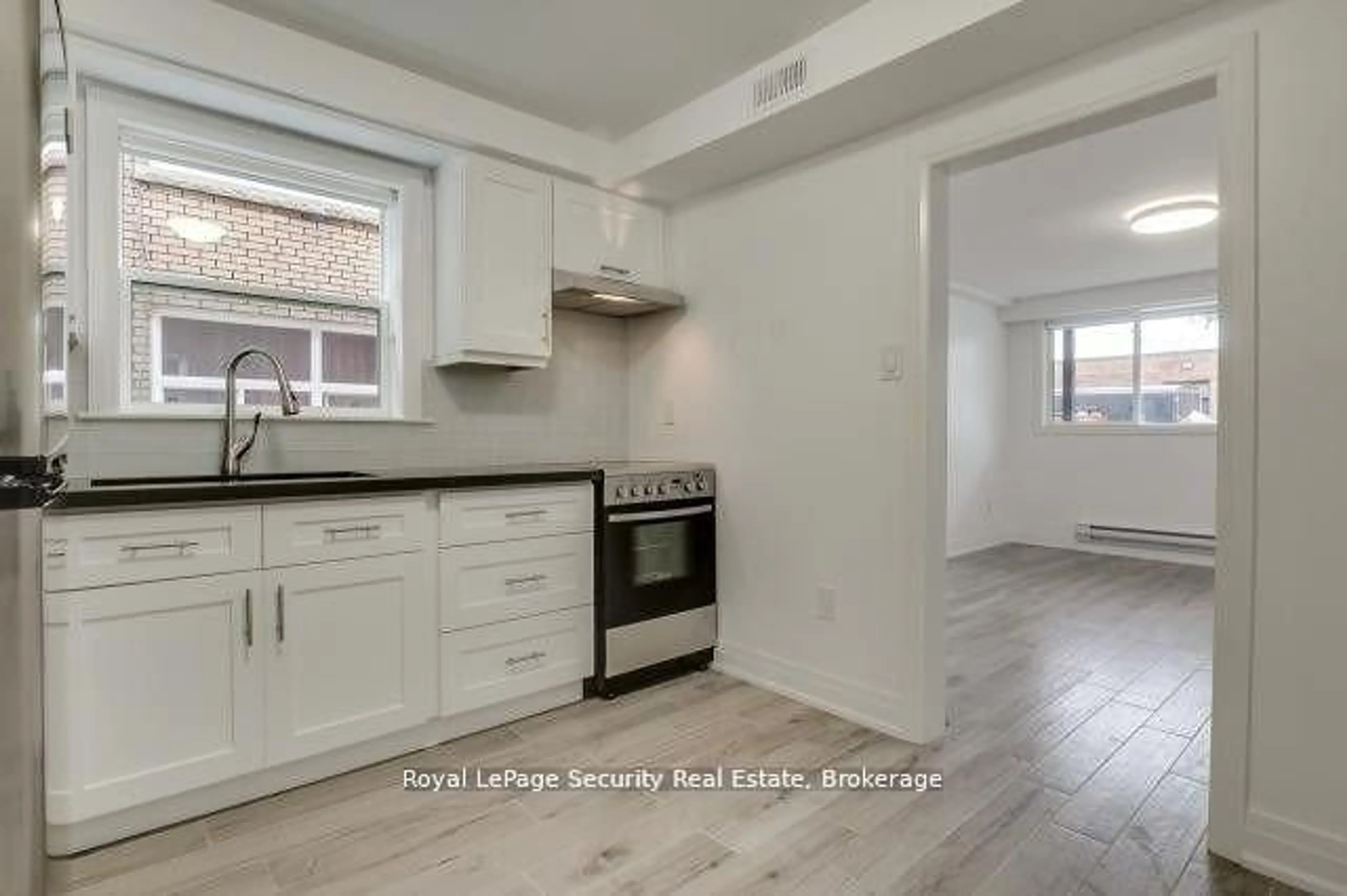 Open concept kitchen, unknown for 148 Portland St, Toronto Ontario M8Y 1B2