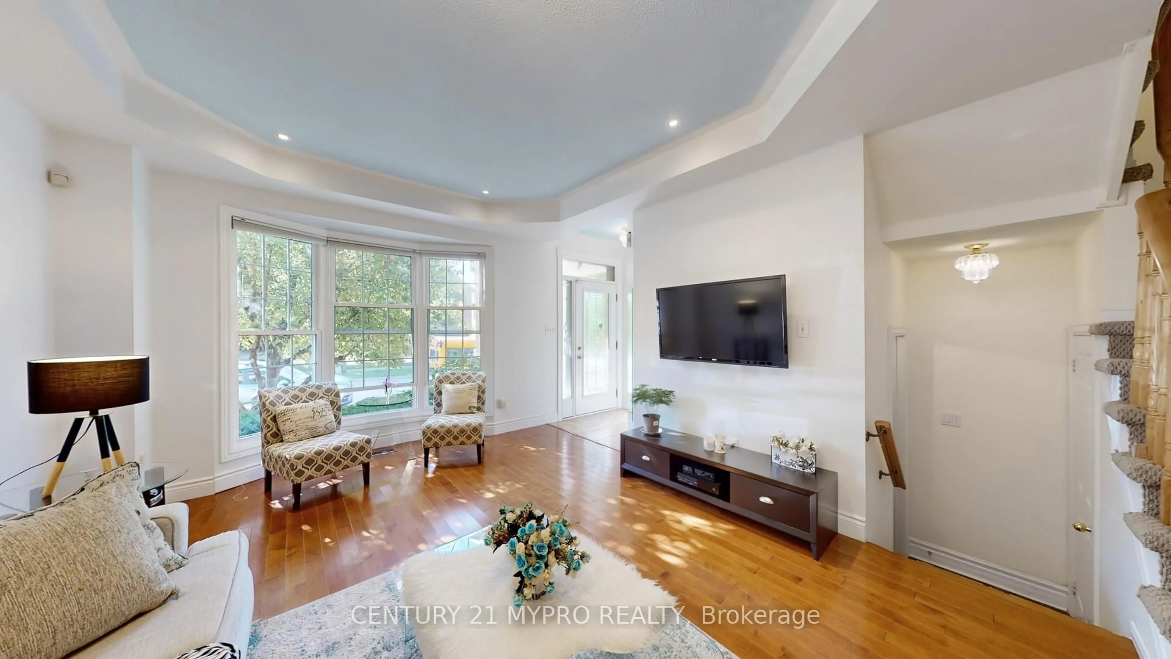 Living room with furniture, wood/laminate floor for 2244 Norfolk Dr, Oakville Ontario L6H 6H4