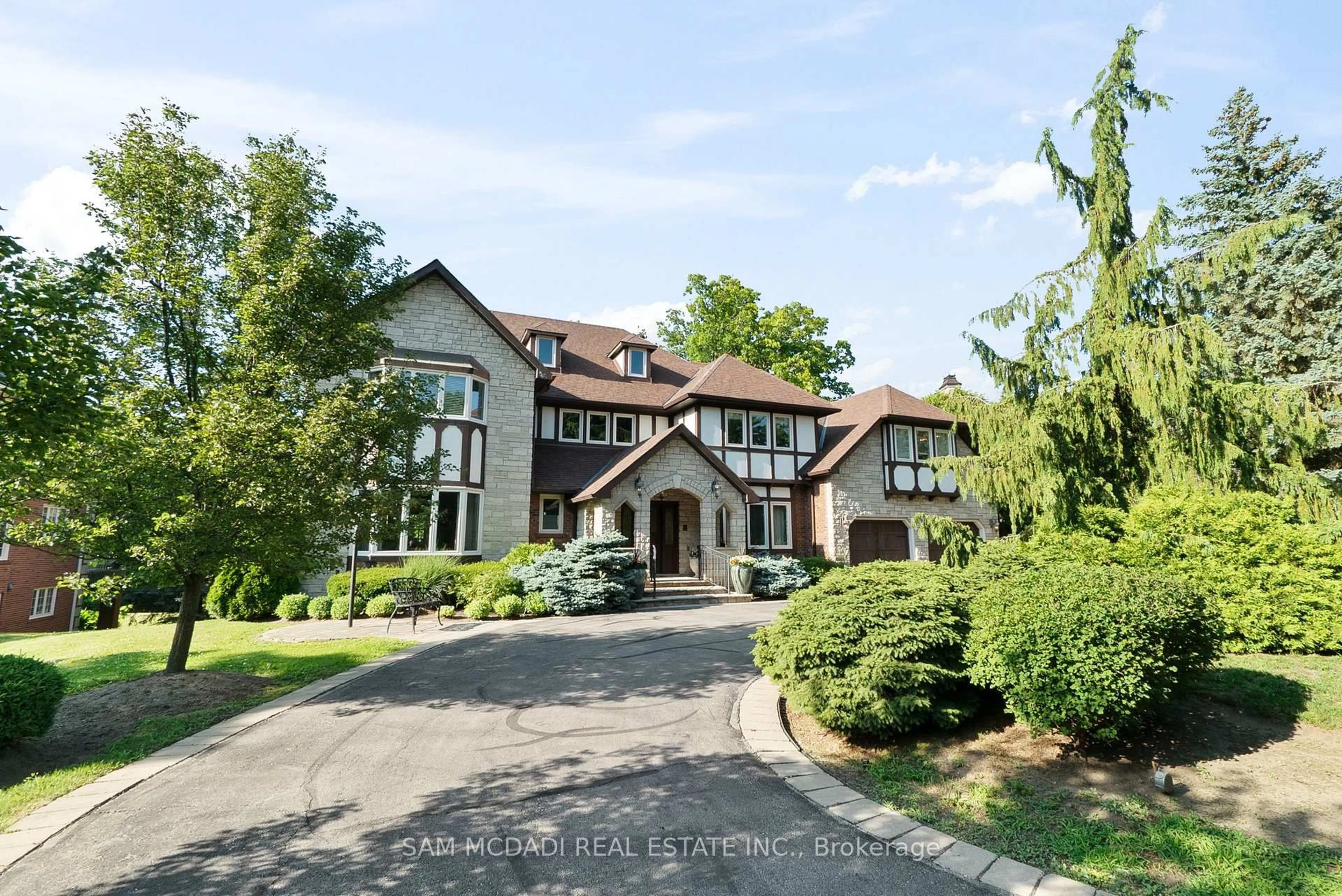 Home with brick exterior material, street for 2235 Shawanaga Tr, Mississauga Ontario L5H 3X6