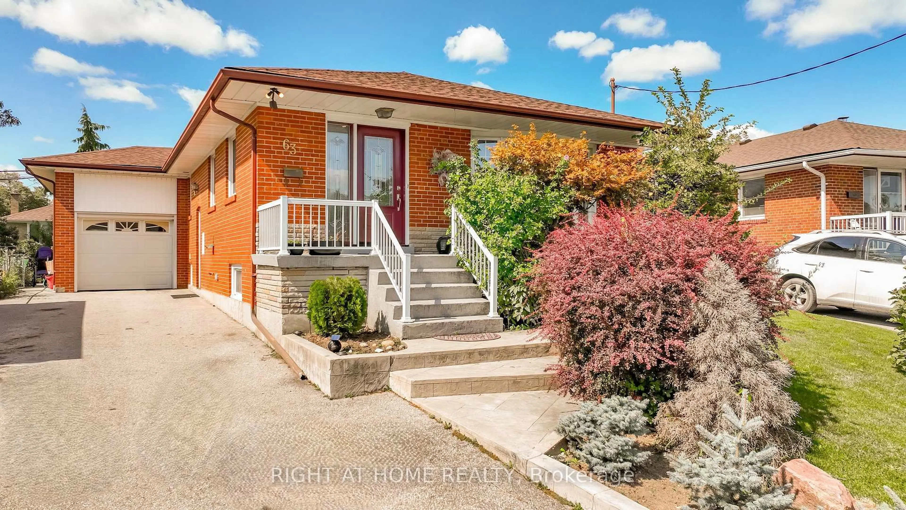 Home with brick exterior material, street for 63 Allonsius Dr, Toronto Ontario M9C 3N6