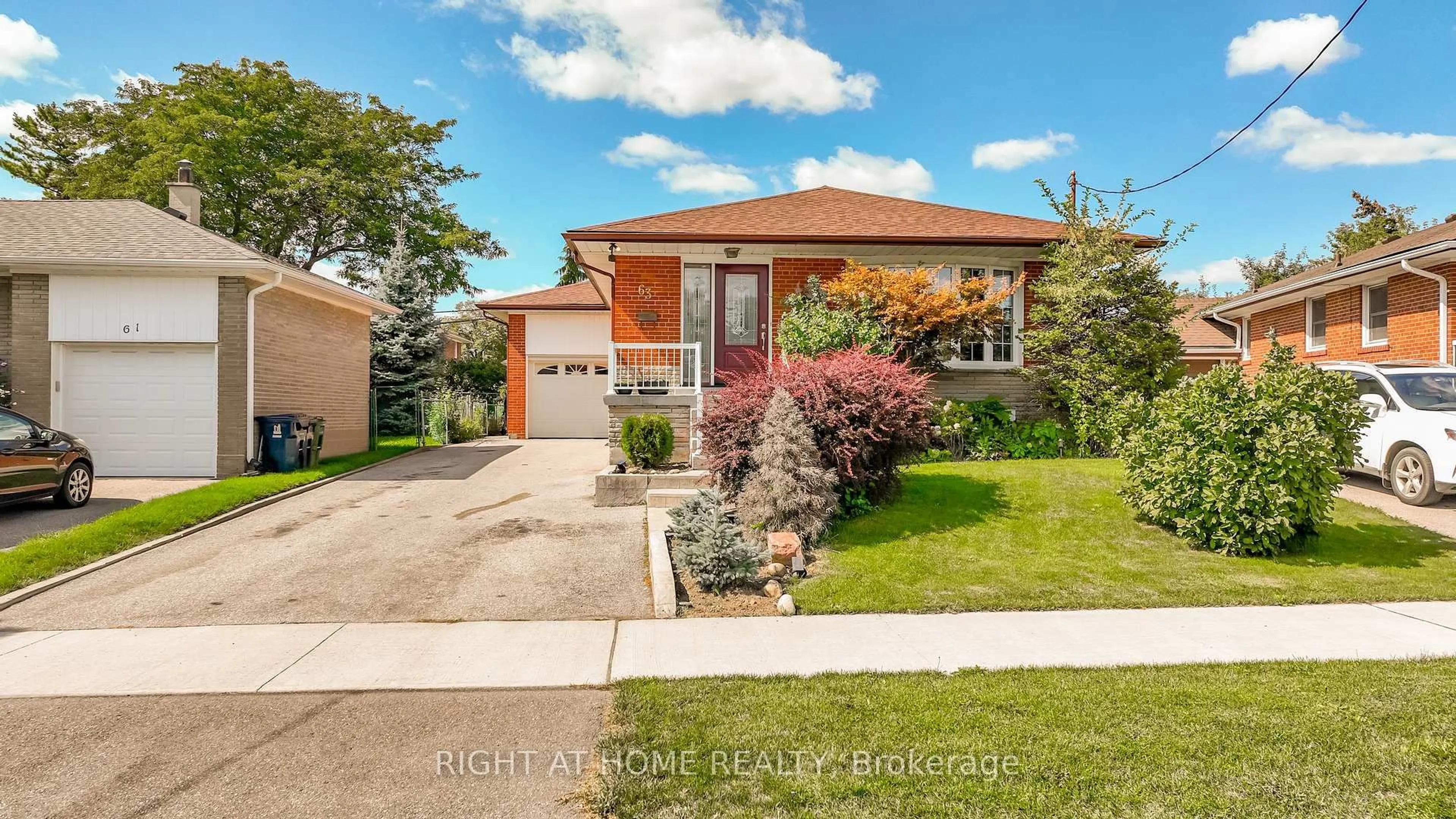 Home with brick exterior material, street for 63 Allonsius Dr, Toronto Ontario M9C 3N6