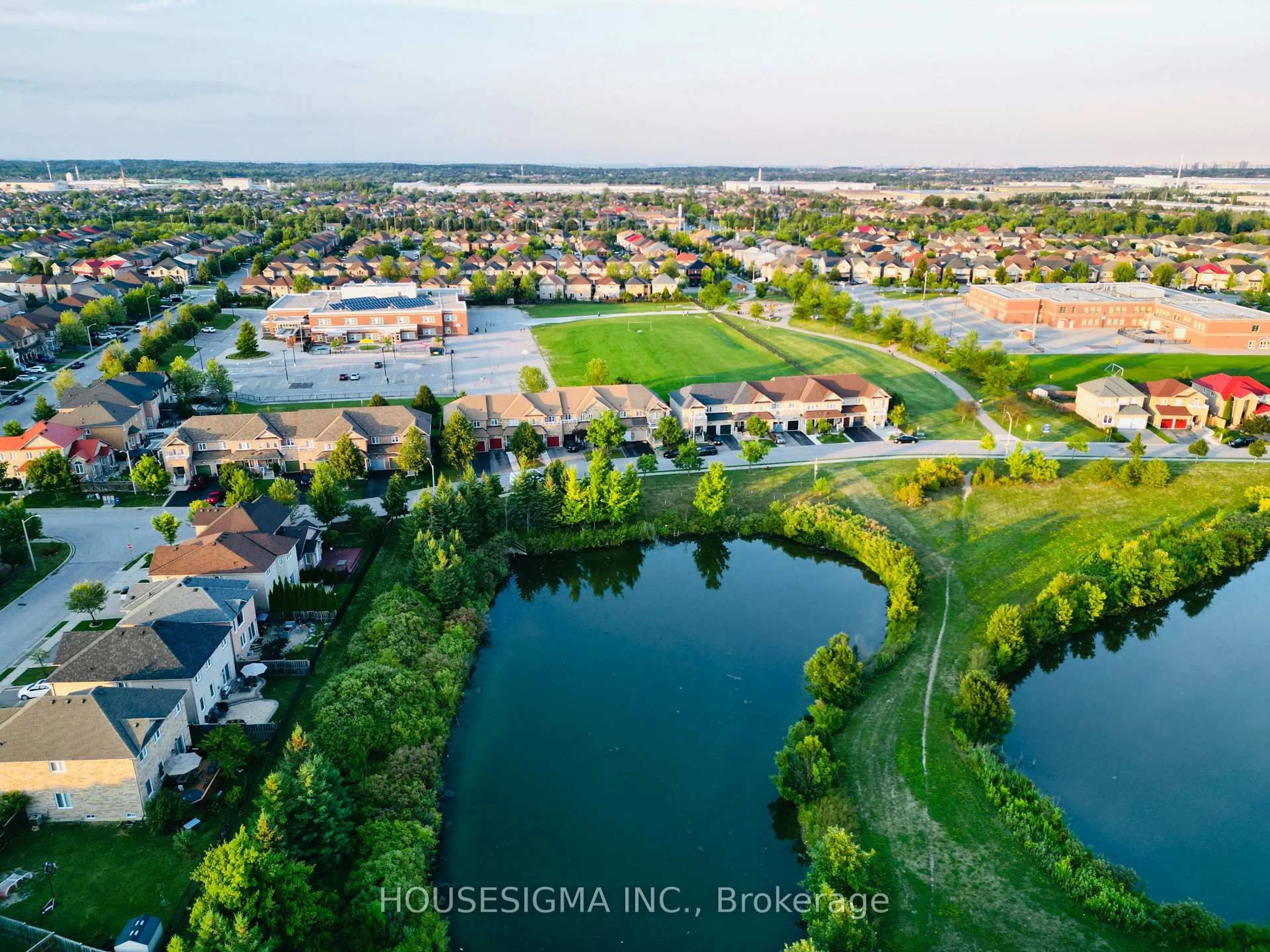 A pic from outside/outdoor area/front of a property/back of a property/a pic from drone, water/lake/river/ocean view for 77 Beavervalley Dr, Brampton Ontario L7A 3R3
