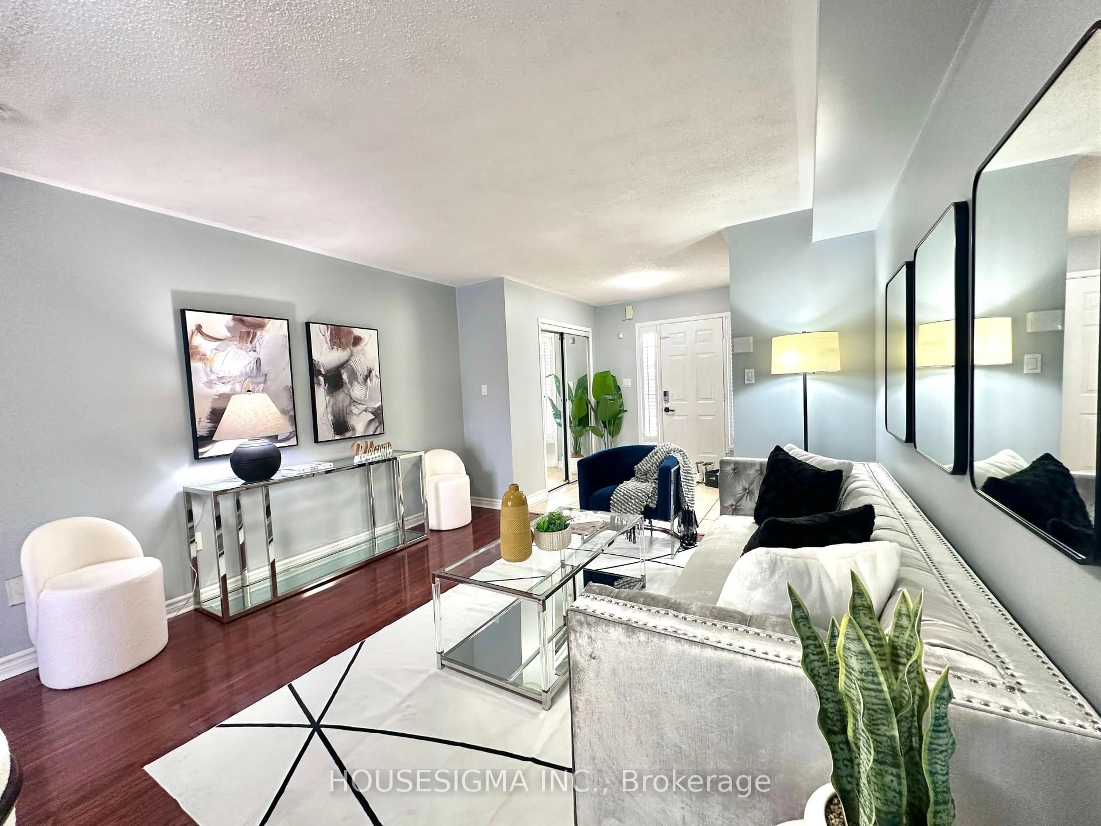 Living room with furniture, unknown for 77 Beavervalley Dr, Brampton Ontario L7A 3R3