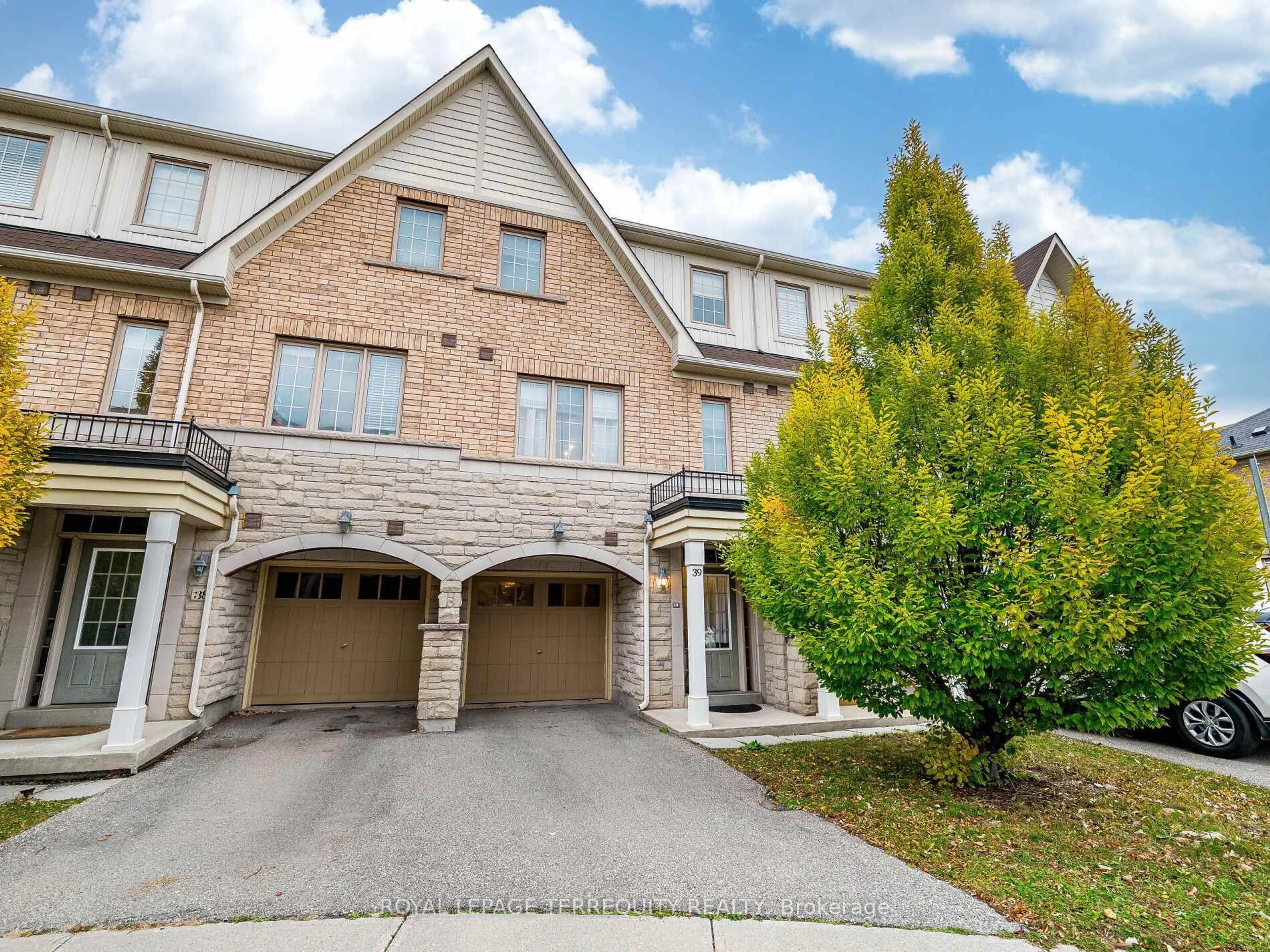 Home with brick exterior material, street for 2171 Fiddlers Way #39, Oakville Ontario L6M 0R9