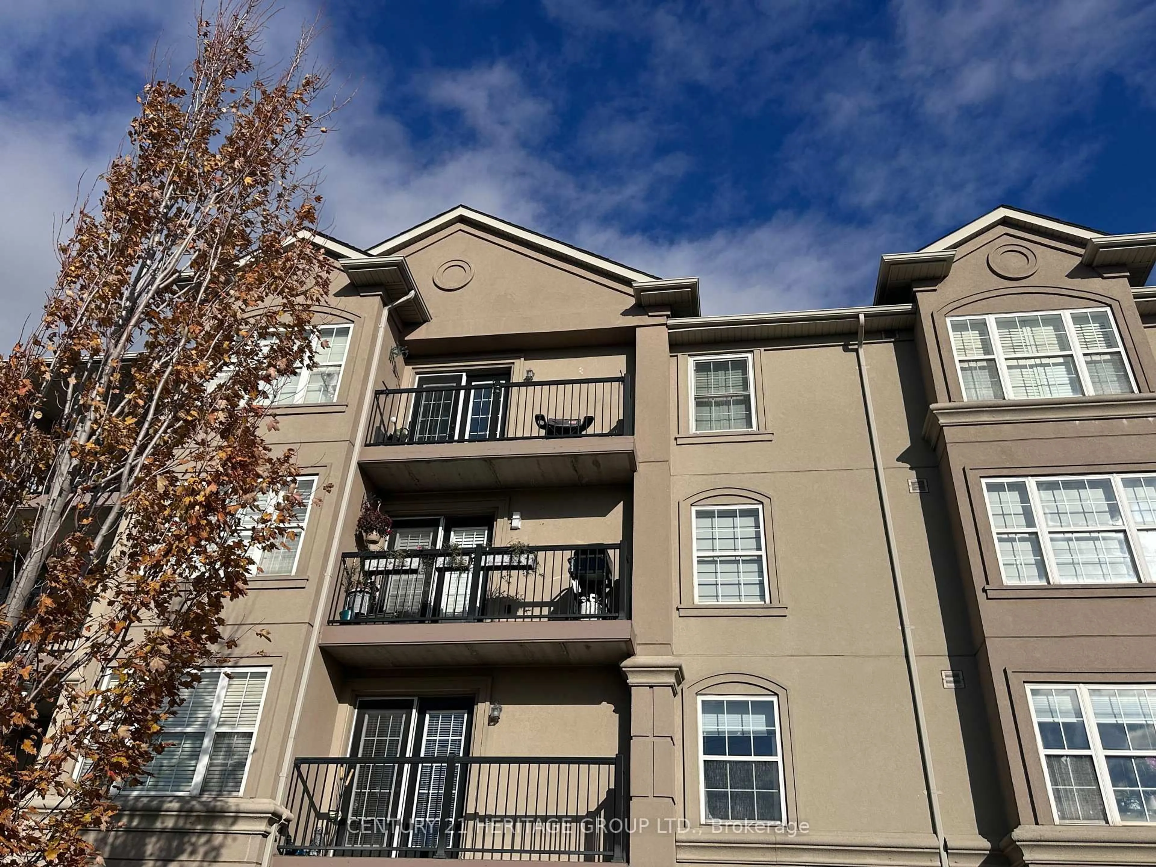 A pic from outside/outdoor area/front of a property/back of a property/a pic from drone, unknown for 2085 Appleby Line #312, Burlington Ontario L7L 7H4