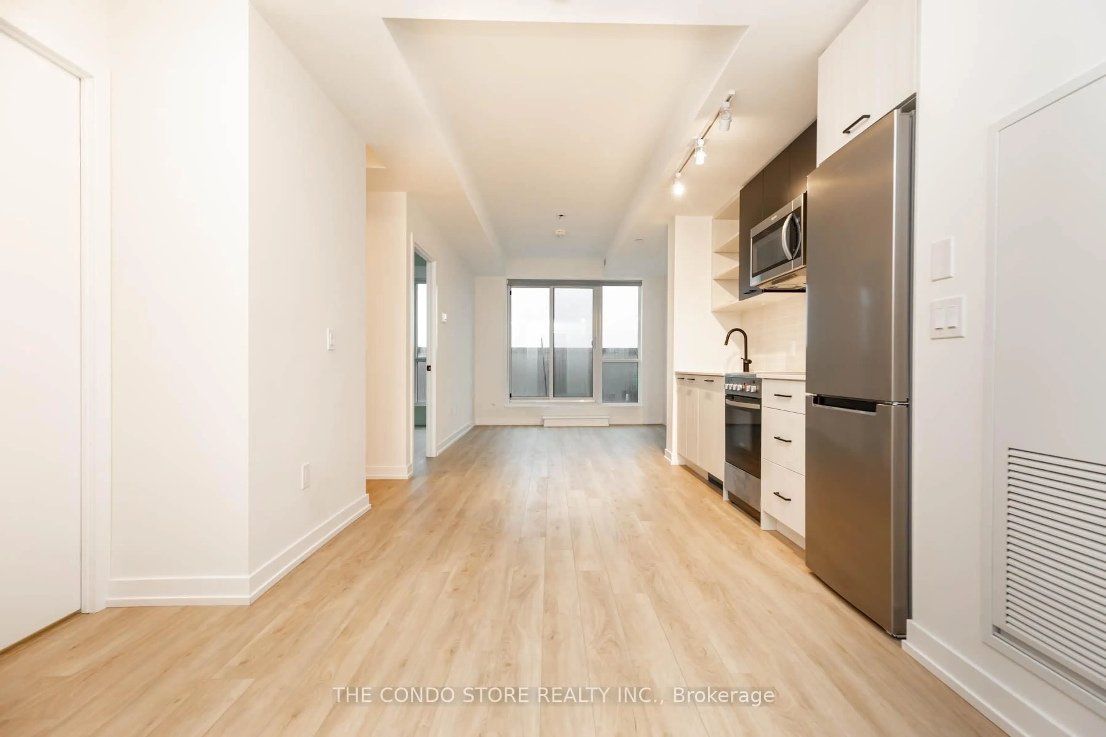 Standard kitchen, wood/laminate floor for 2300 St. Clair Ave #524, Toronto Ontario M6N 1K8