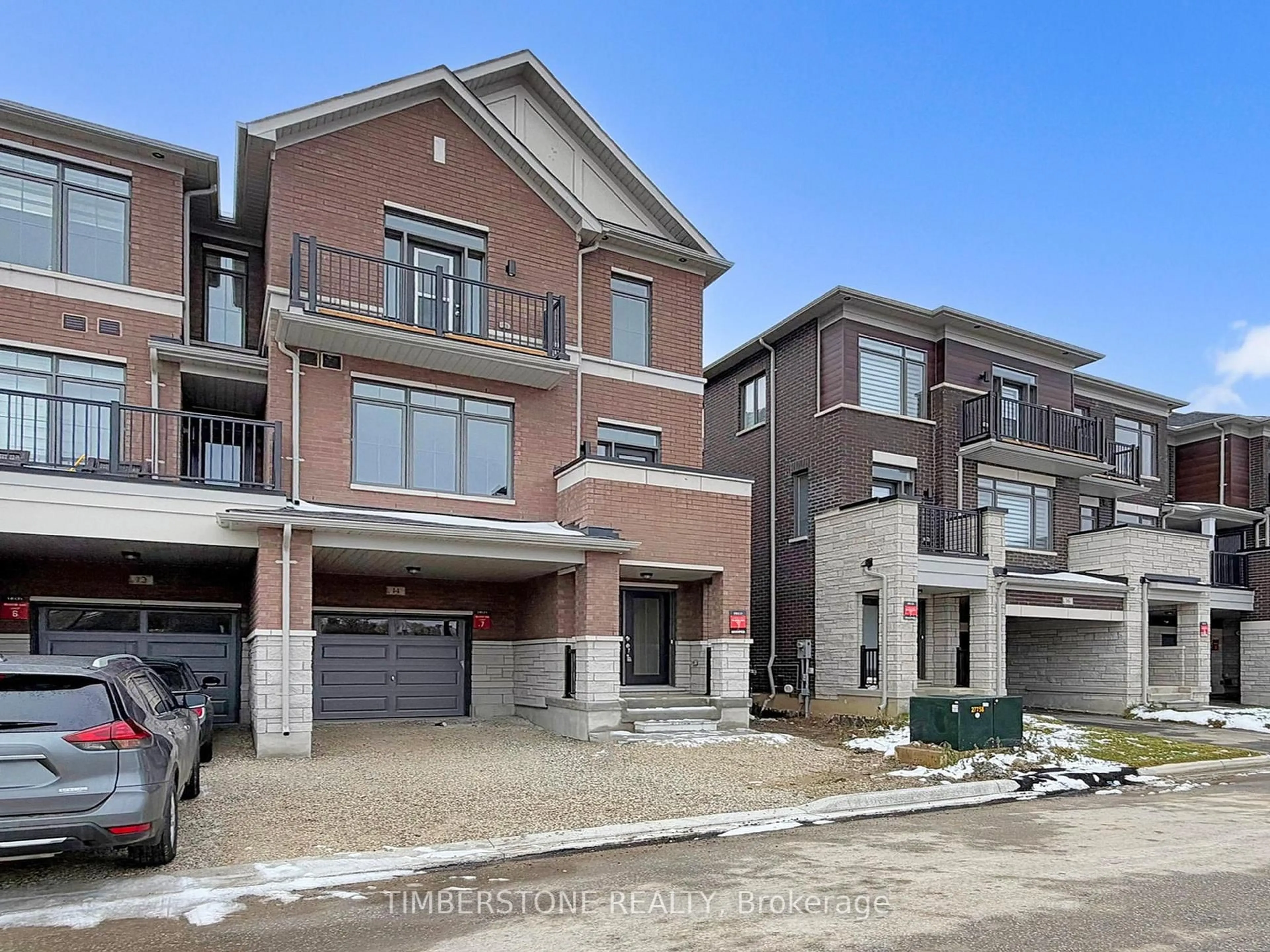 Home with brick exterior material, street for 14 Monreau Dr, Brampton Ontario L7A 5M1