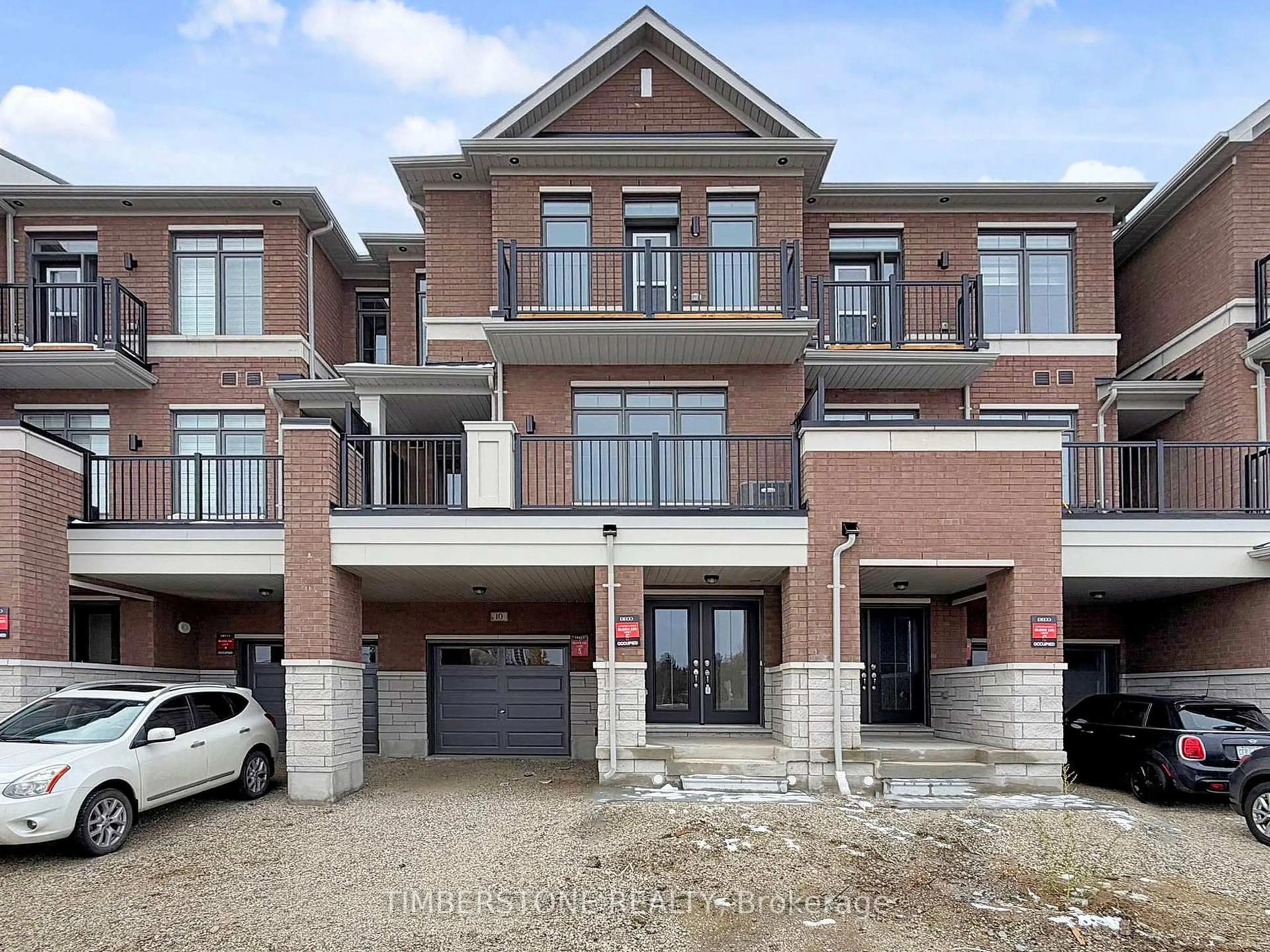 Home with brick exterior material, street for 10 Monreau Dr, Brampton Ontario L7A 5M1