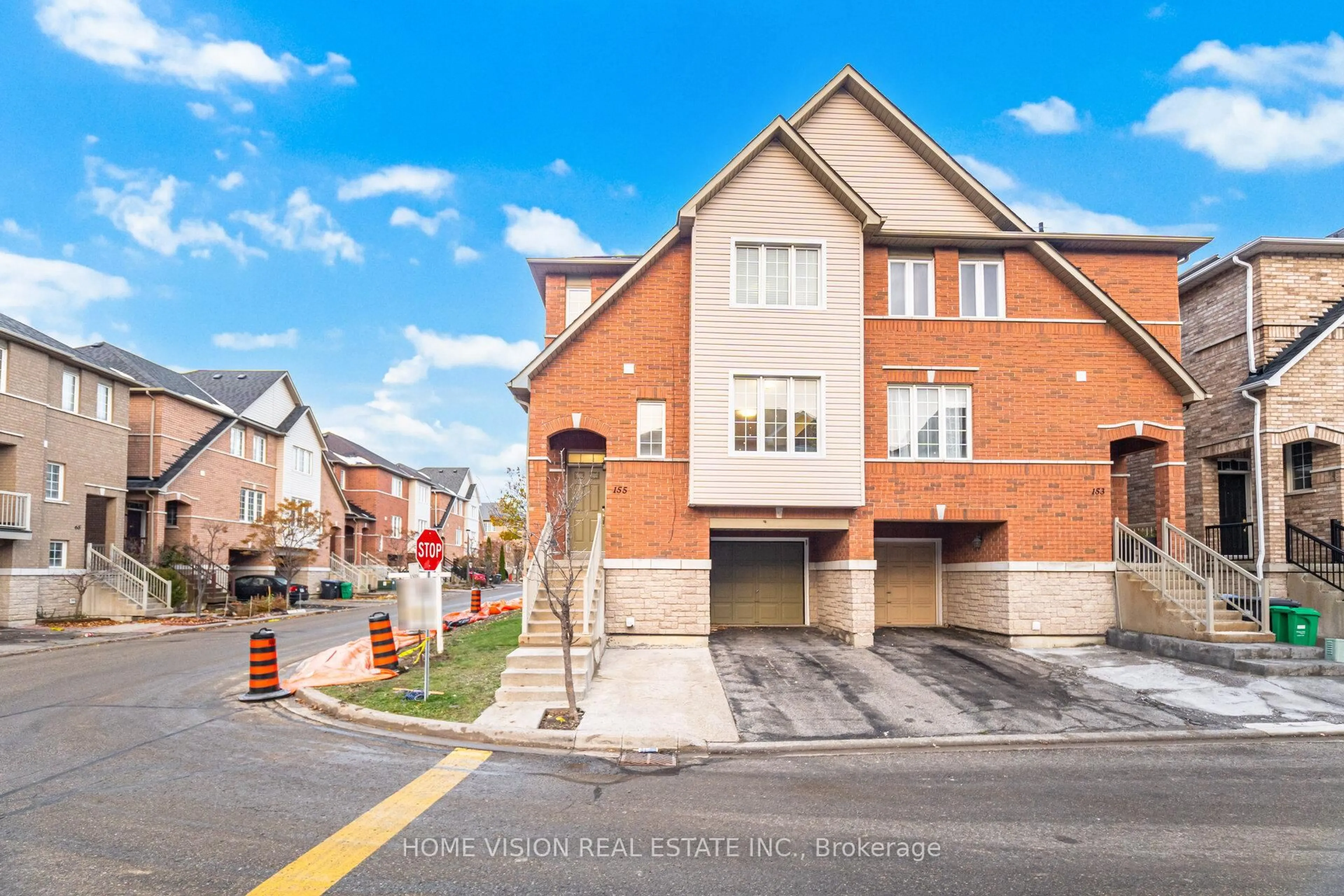 Home with brick exterior material, street for 7155 Magistrate Terr #155, Mississauga Ontario L5W 1Y9